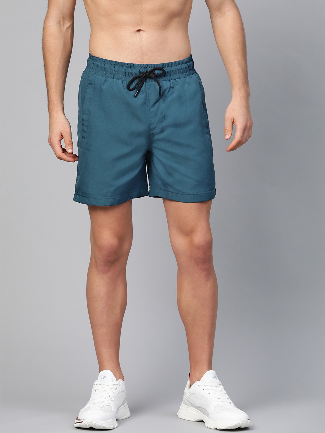 

HRX by Hrithik Roshan Men Teal Blue Solid Rapid Dry Regular Fit Training Shorts