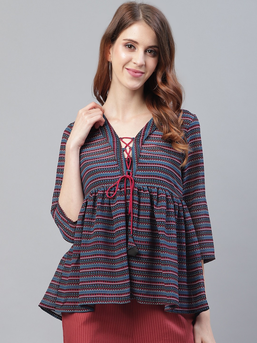 

Azira Women Blue & Maroon Striped Empire Top