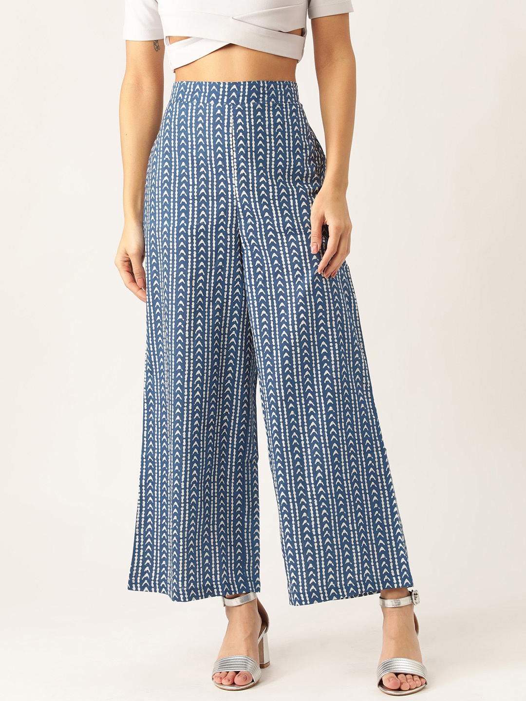 

Sangria Women Navy Blue & White Printed Wide Leg Palazzos