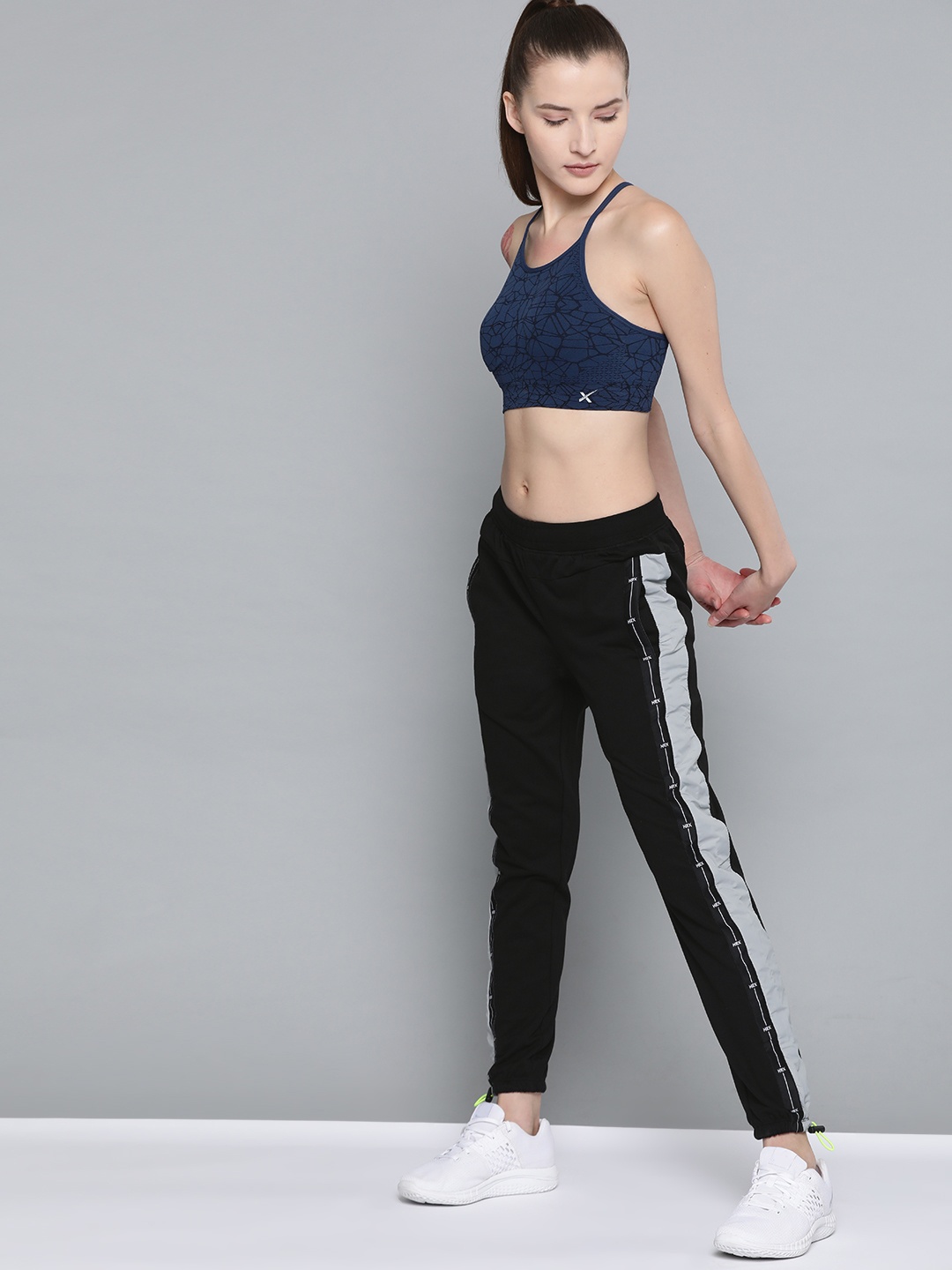 

HRX by Hrithik Roshan Women Black Solid Slim Jogger Fit Bio-Wash Lifestyle Track Pants