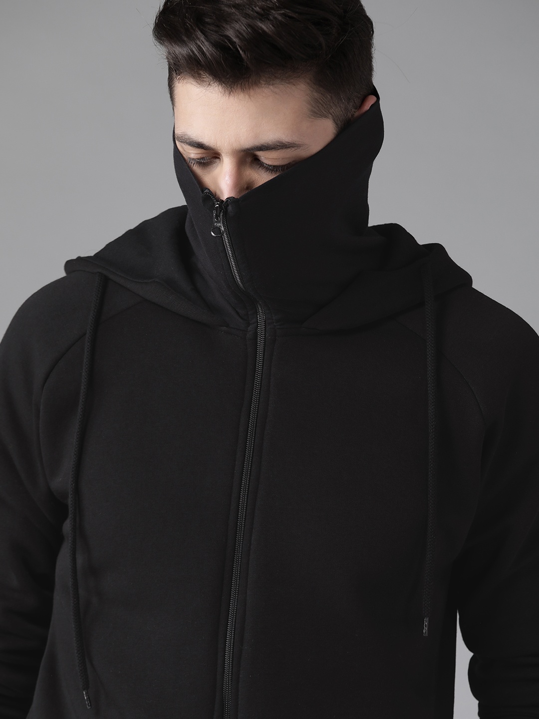 

Roadster Men Black Solid Hooded Sweatshirt