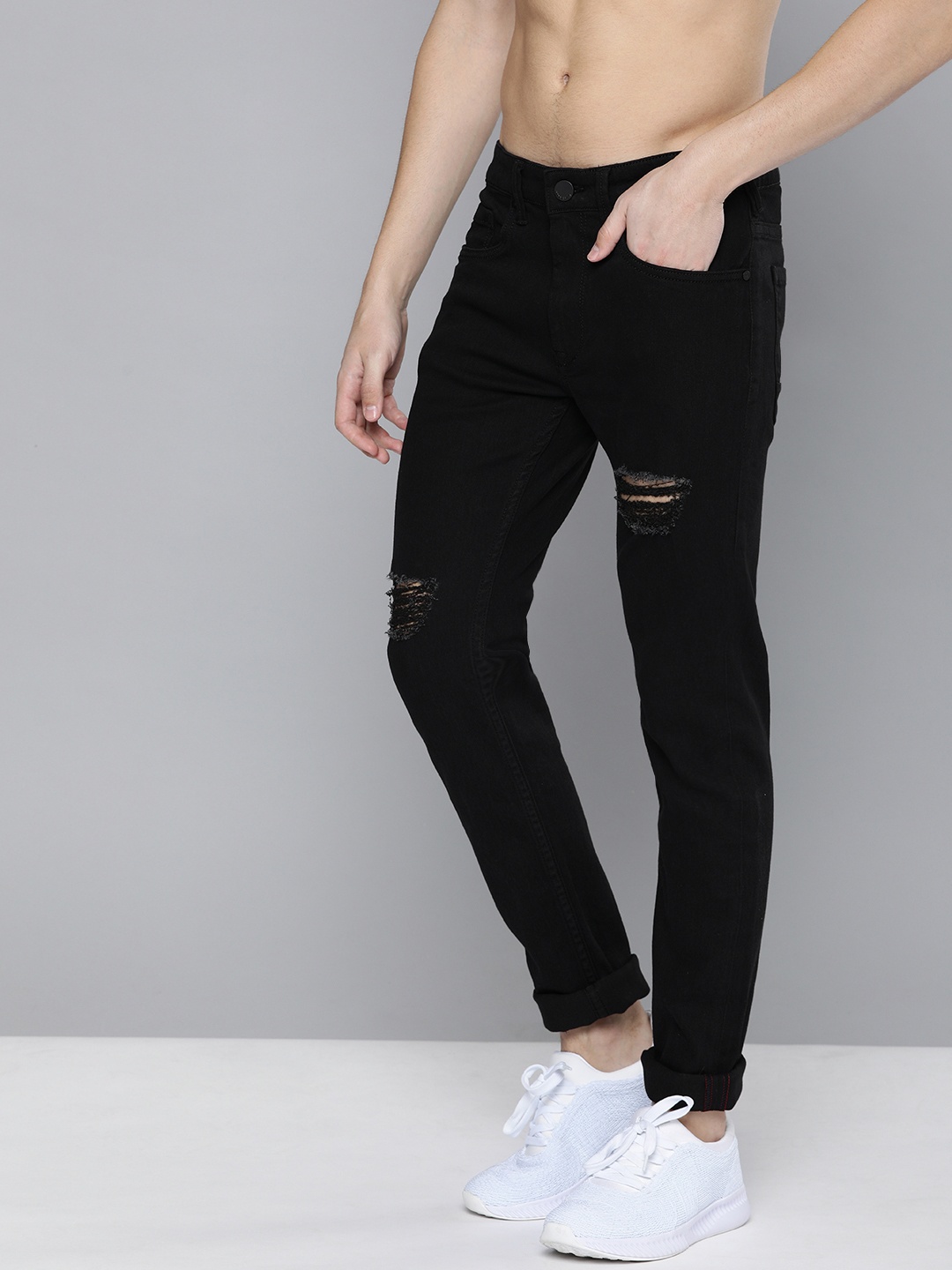 

HERE&NOW Men Black Skinny Fit Mid-Rise Mildly Distressed Stretchable Jeans