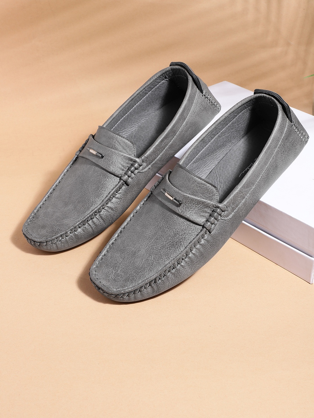 

Mast & Harbour Men Charcoal Grey Solid Loafers