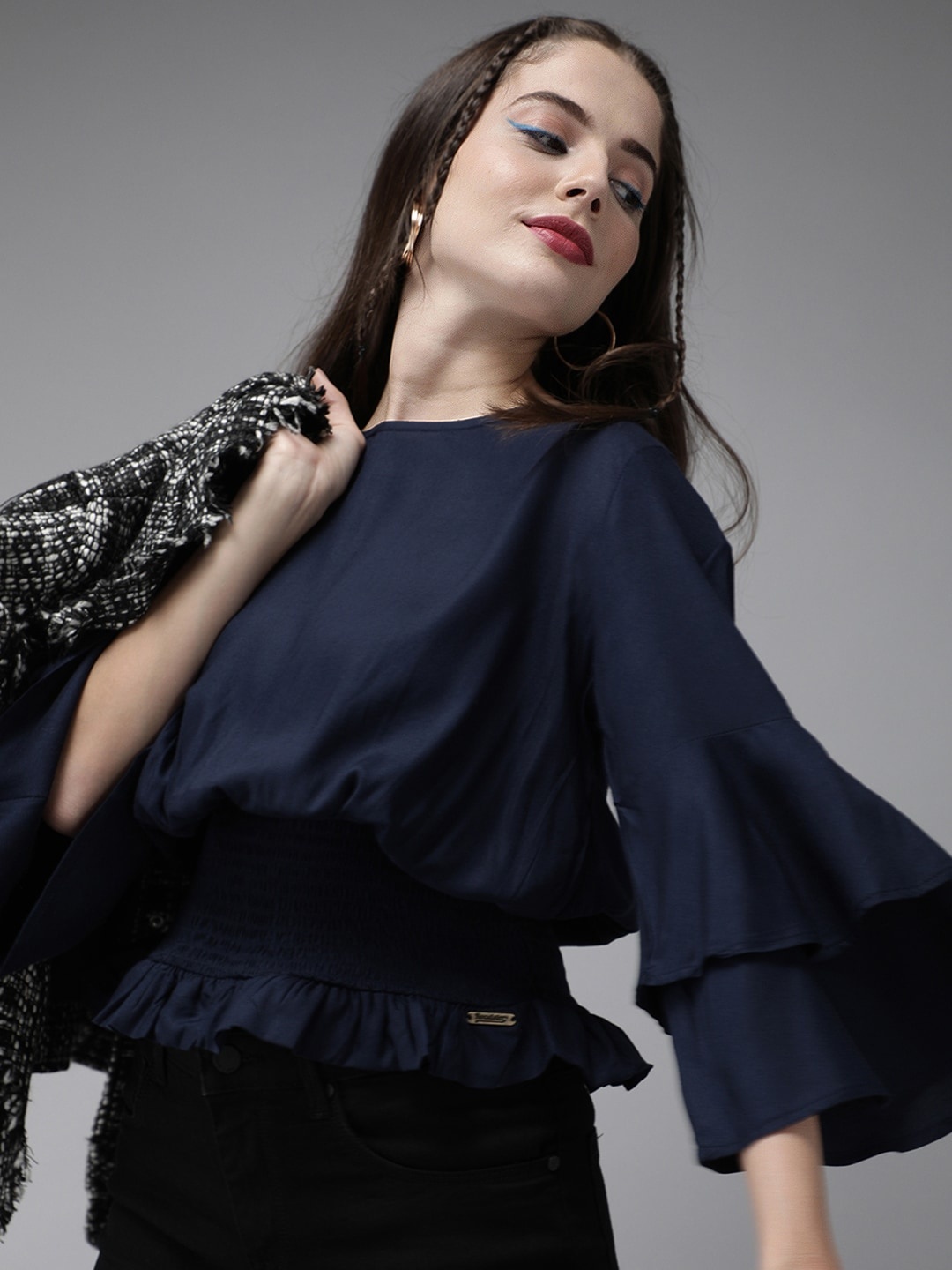 

Roadster Greenturn Women Navy Blue Solid Smocked Blouson Top With Bell Sleeves