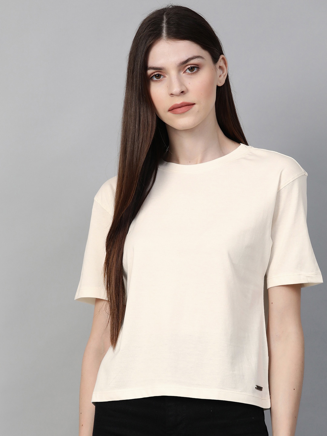 

Roadster Women Off-White Solid Round Neck T-shirt