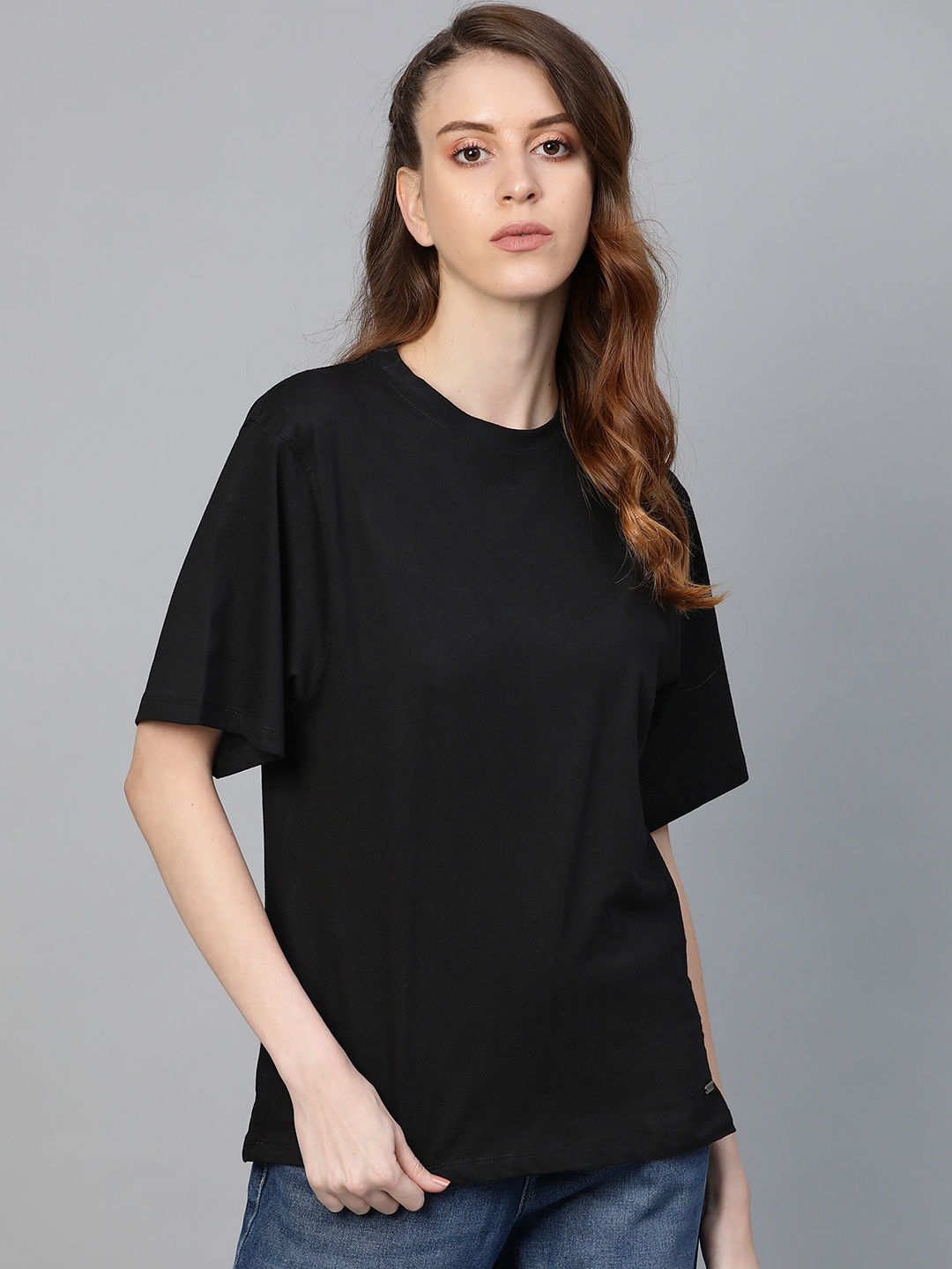 

Roadster Women Black Solid Round Neck T-shirt