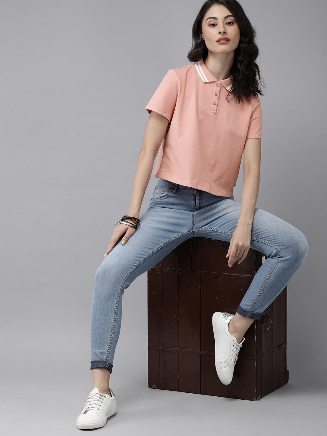 

Roadster Women Peach-Coloured Solid Polo Collar Crop T-shirt