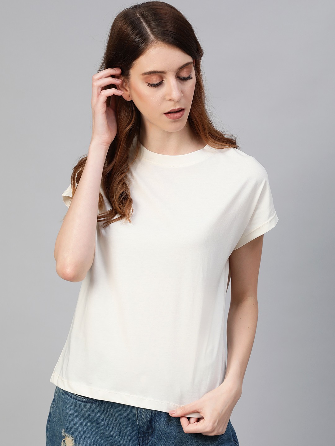 

Roadster Women Off-White Solid Round Neck Pure Cotton T-shirt