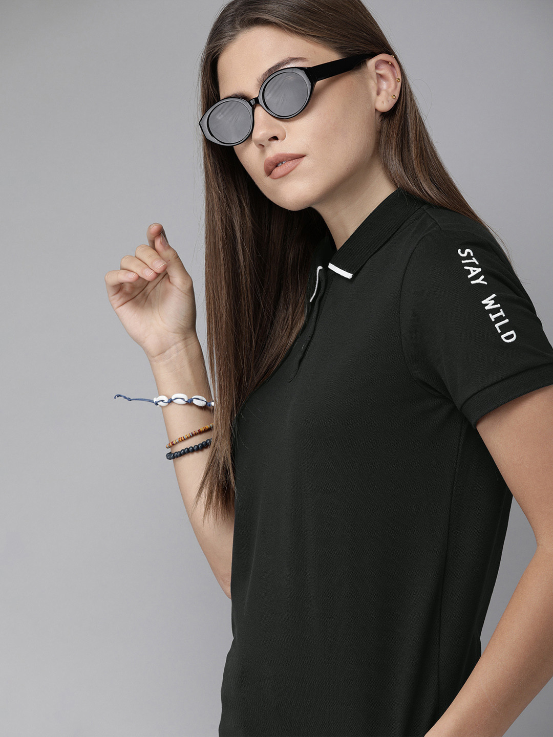 

Roadster Women Black Solid Polo Collar T-shirt