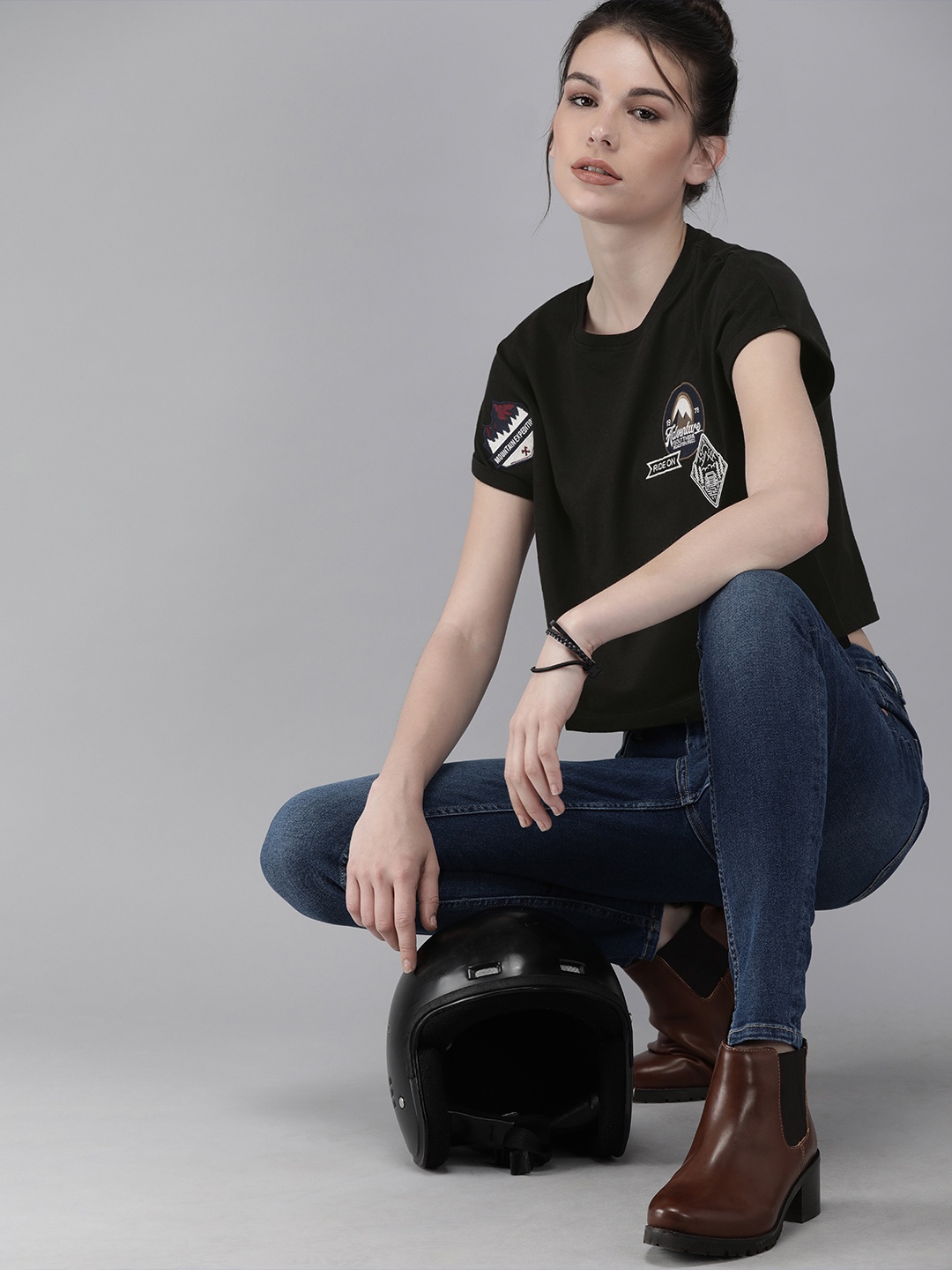 

Roadster Women Black Self Design Round Neck T-shirt