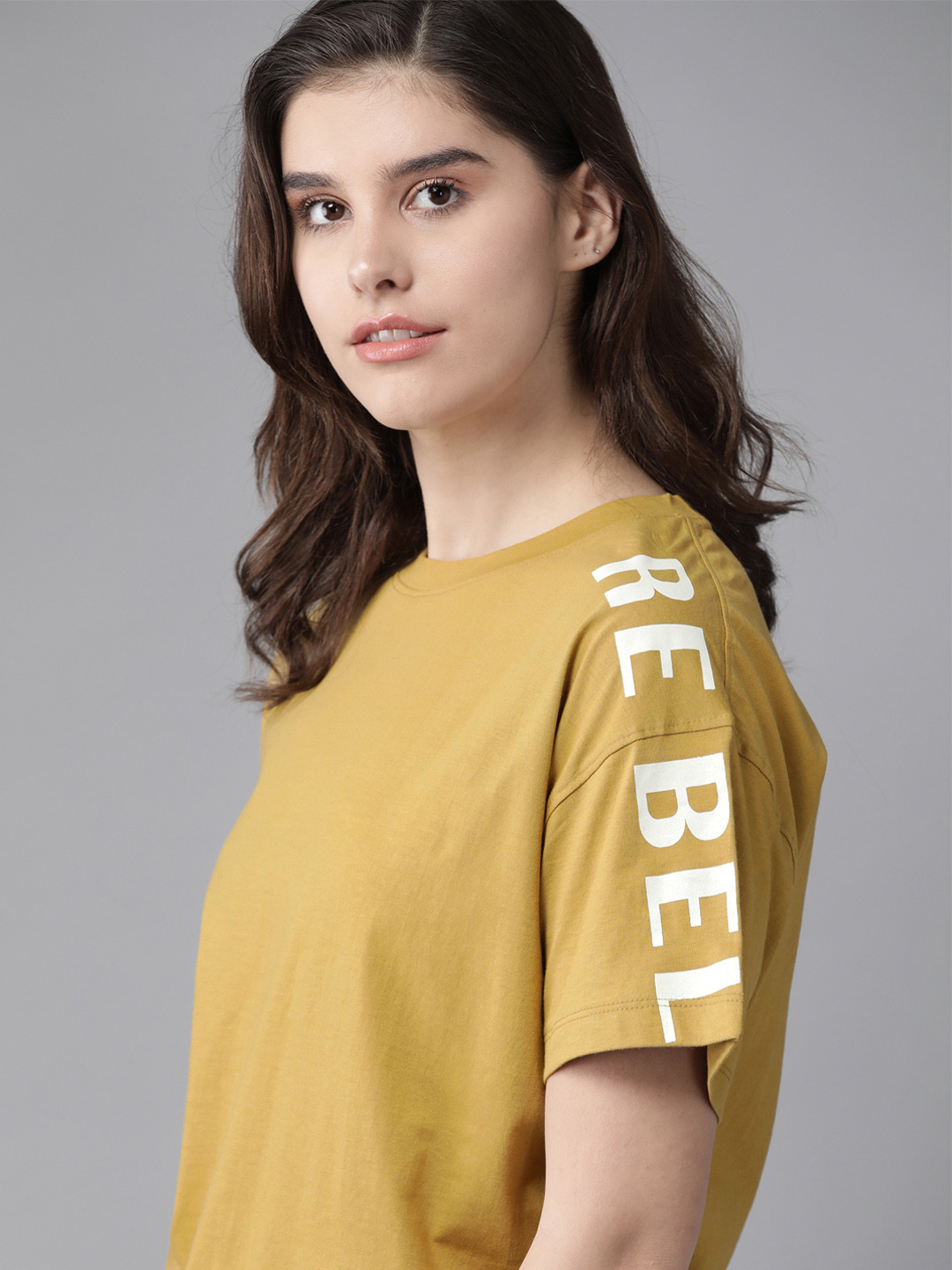 

Roadster Women Khaki Solid Pure Cotton Round Neck T-shirt