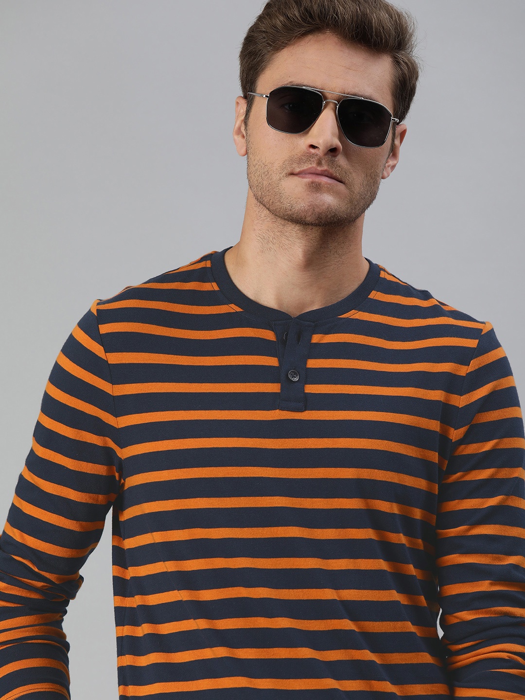

Roadster Men Navy Blue Rust Orange Striped Henley Neck Pure Cotton T-shirt