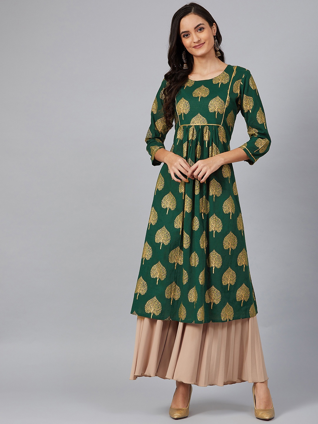 

AHIKA Women Green & Golden Printed A-Line Kurta
