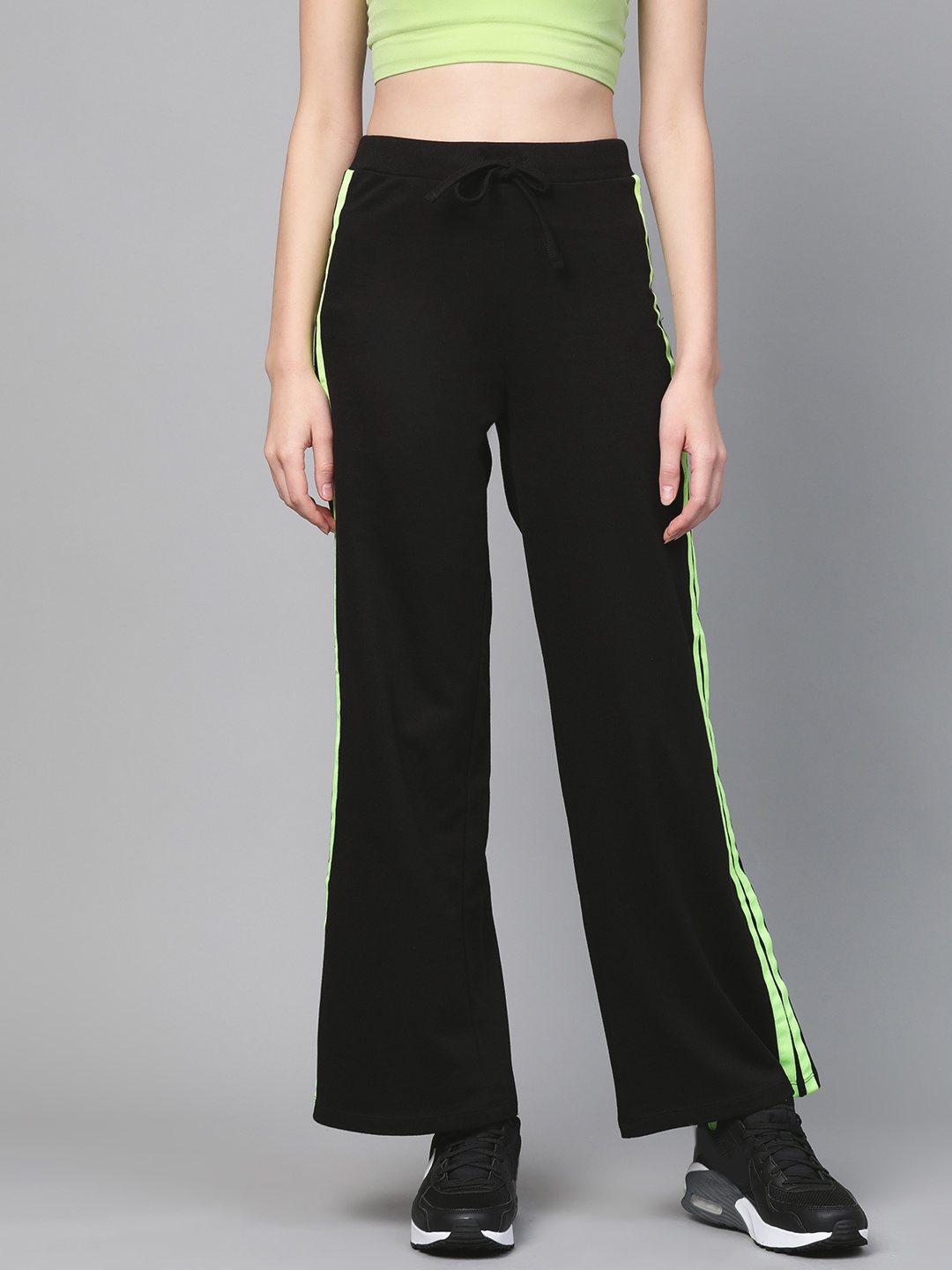 

SASSAFRAS Women Black Regular Fit Solid Parallel Track Pants