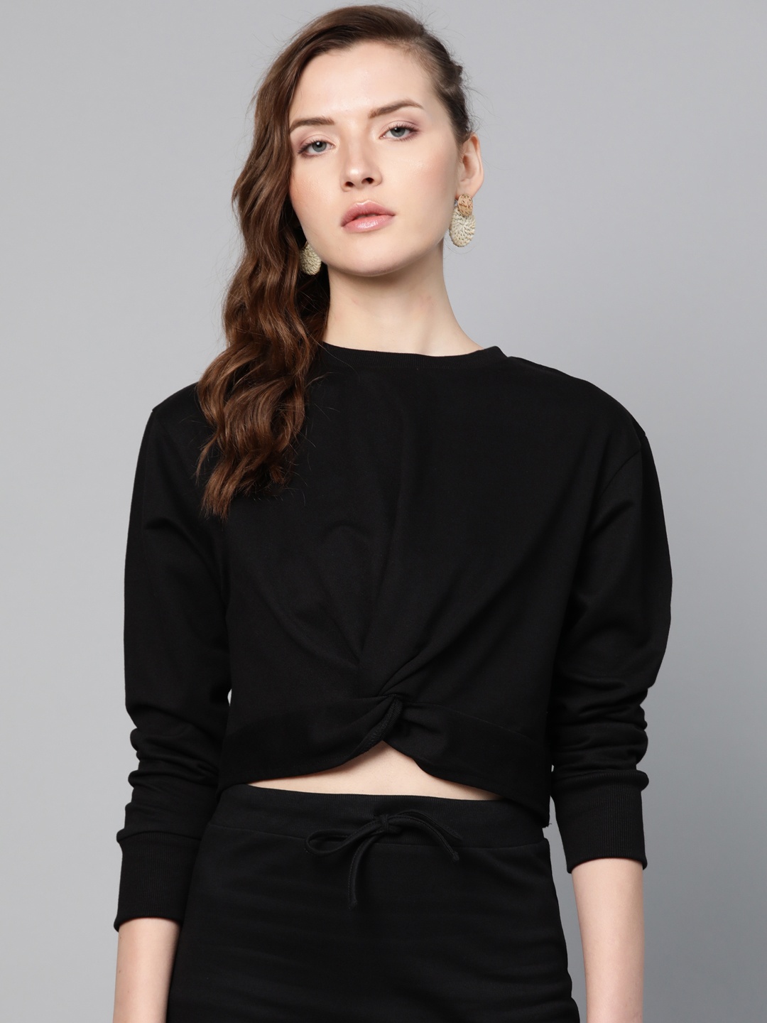 

SASSAFRAS Women Black Twisted Solid Cropped Sweatshirt