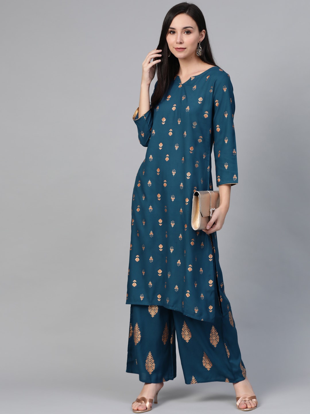 

Jompers Women Teal Blue & Orange Block Printed Kurta with Palazzos