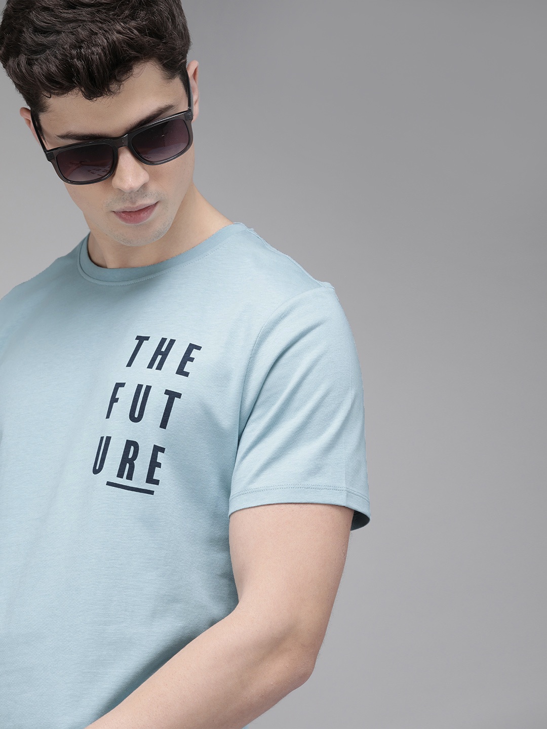 

Roadster Men Blue Placement Printed Round Neck Pure Cotton T-shirt