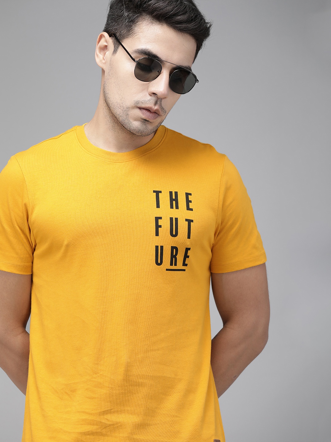 

Roadster Men Yellow Printed Round Neck Pure Cotton T-shirt