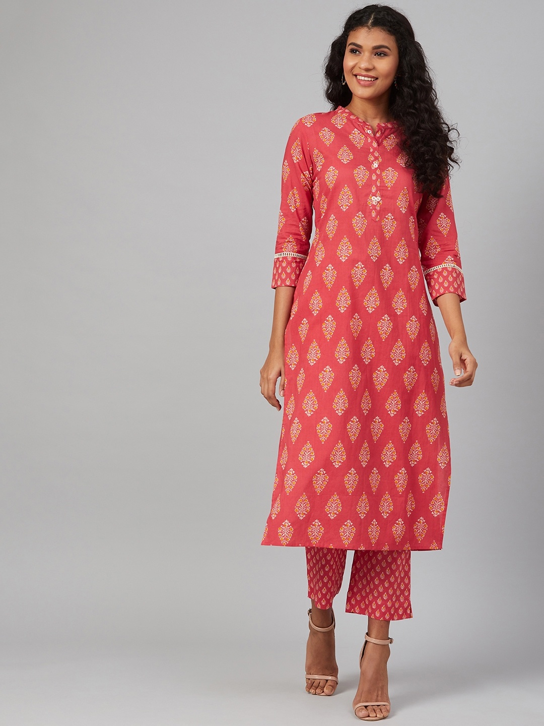 

See Designs Women Coral Pink & Mustard Yellow Printed Kurta with Trousers