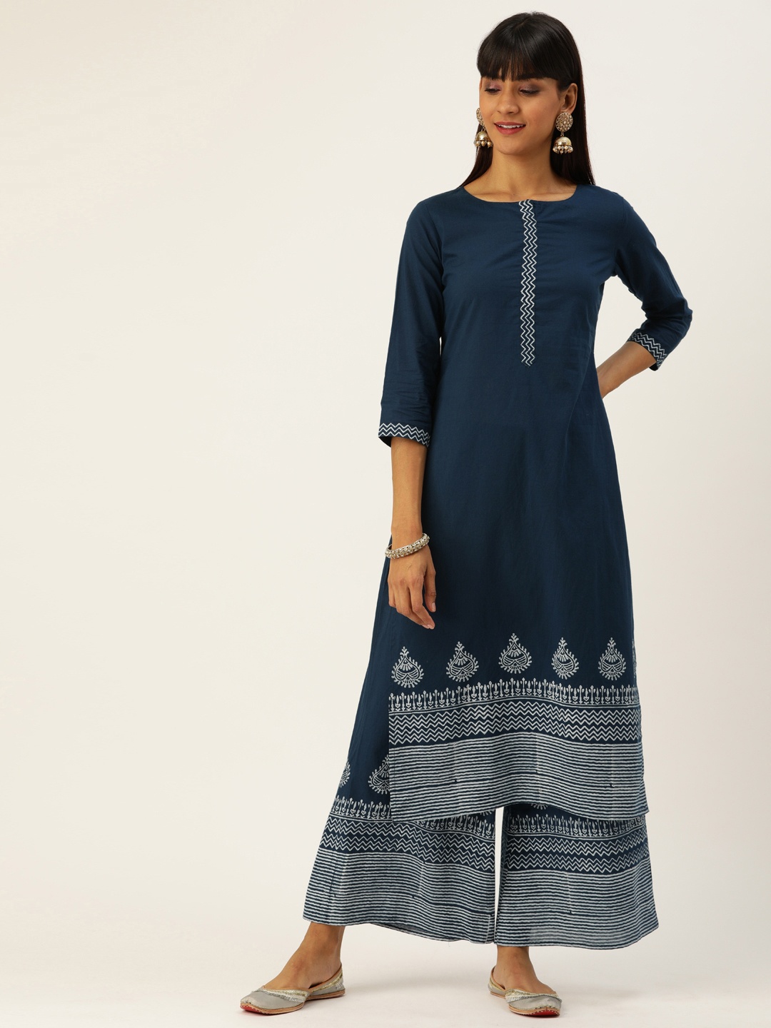 

Varanga Women Blue & White Printed Kurta with Palazzos