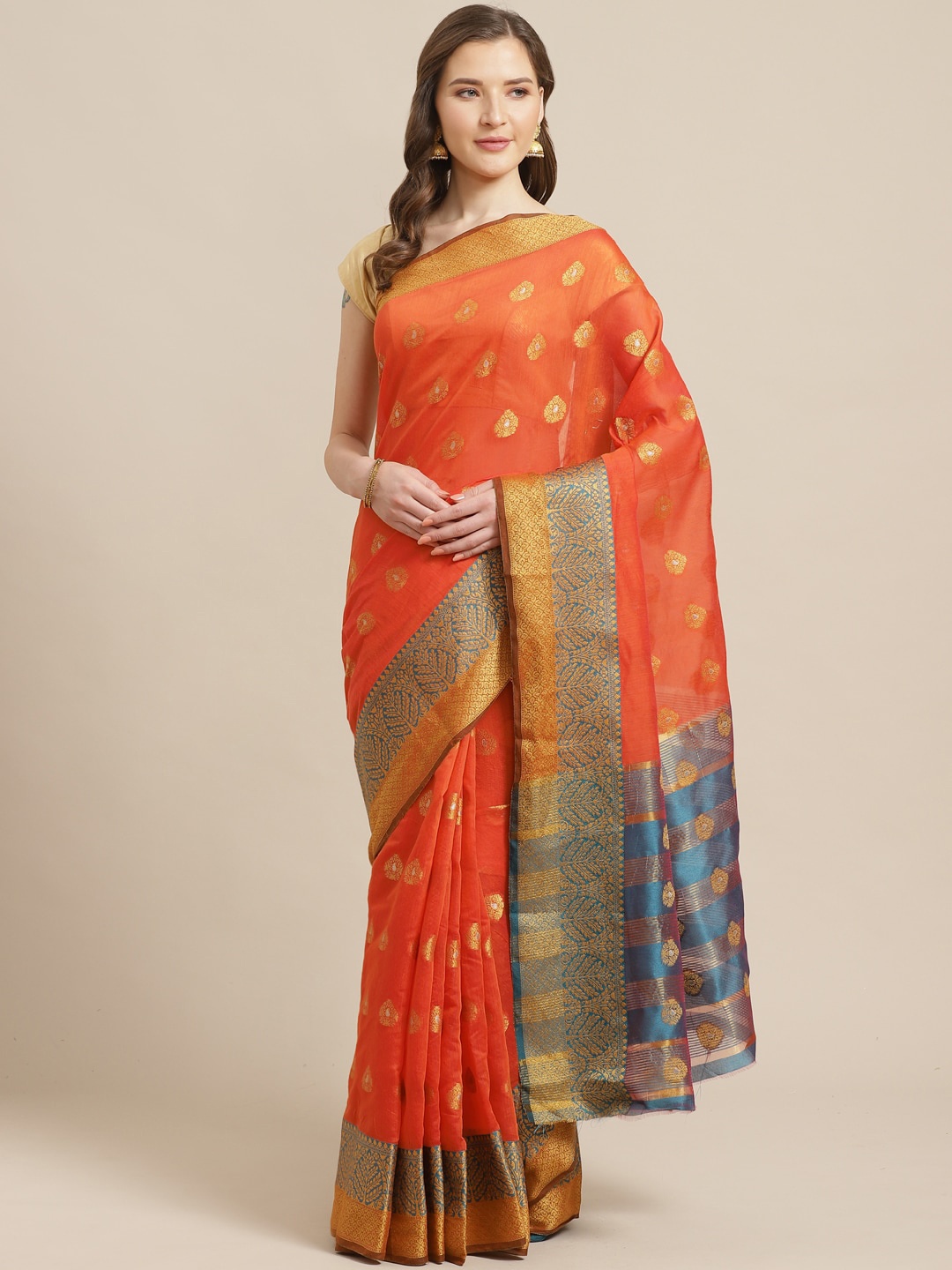 

Shaily Rust Orange & Golden Zari Woven Design Saree