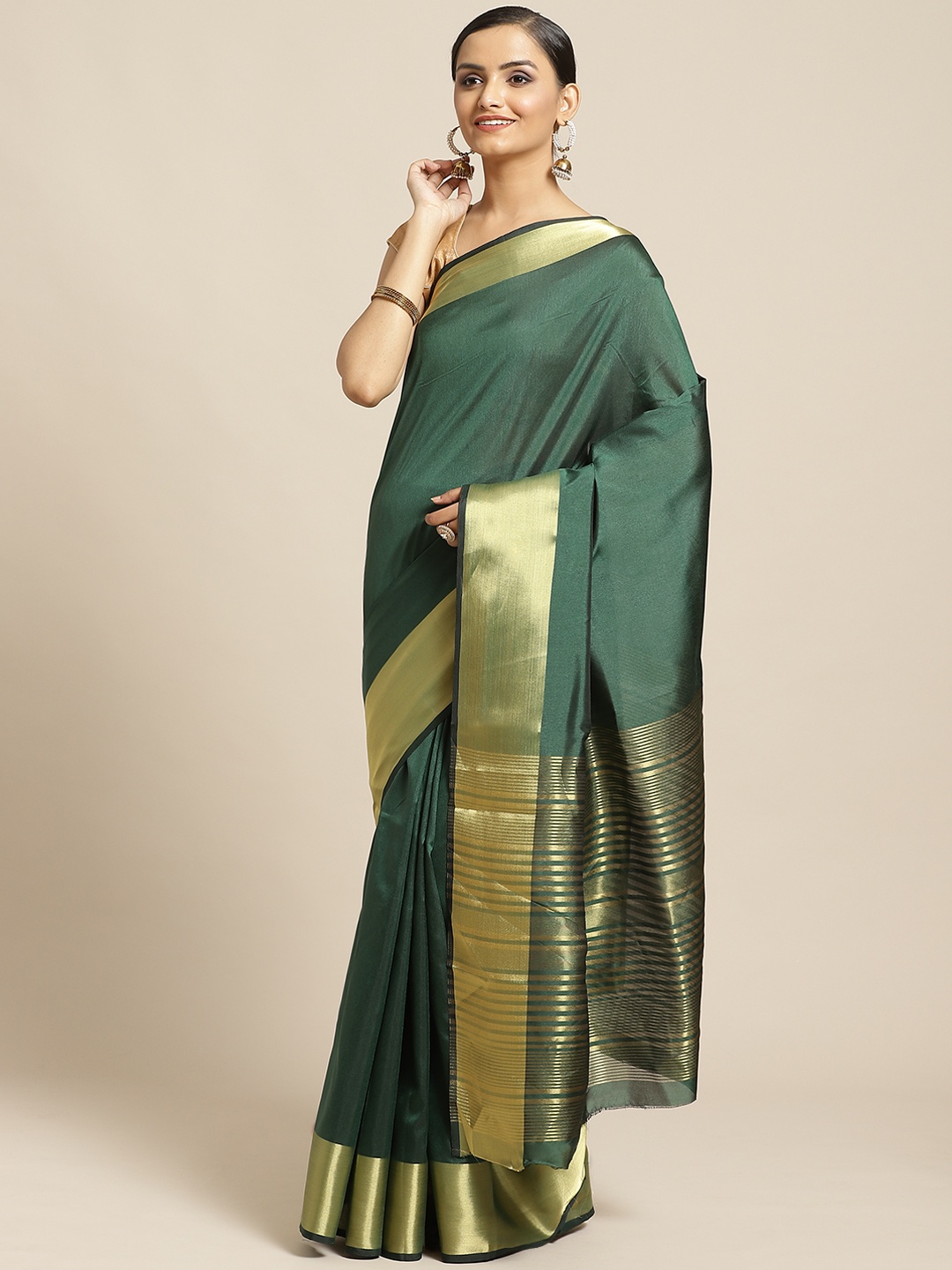 

Shaily Green & Golden Solid Saree