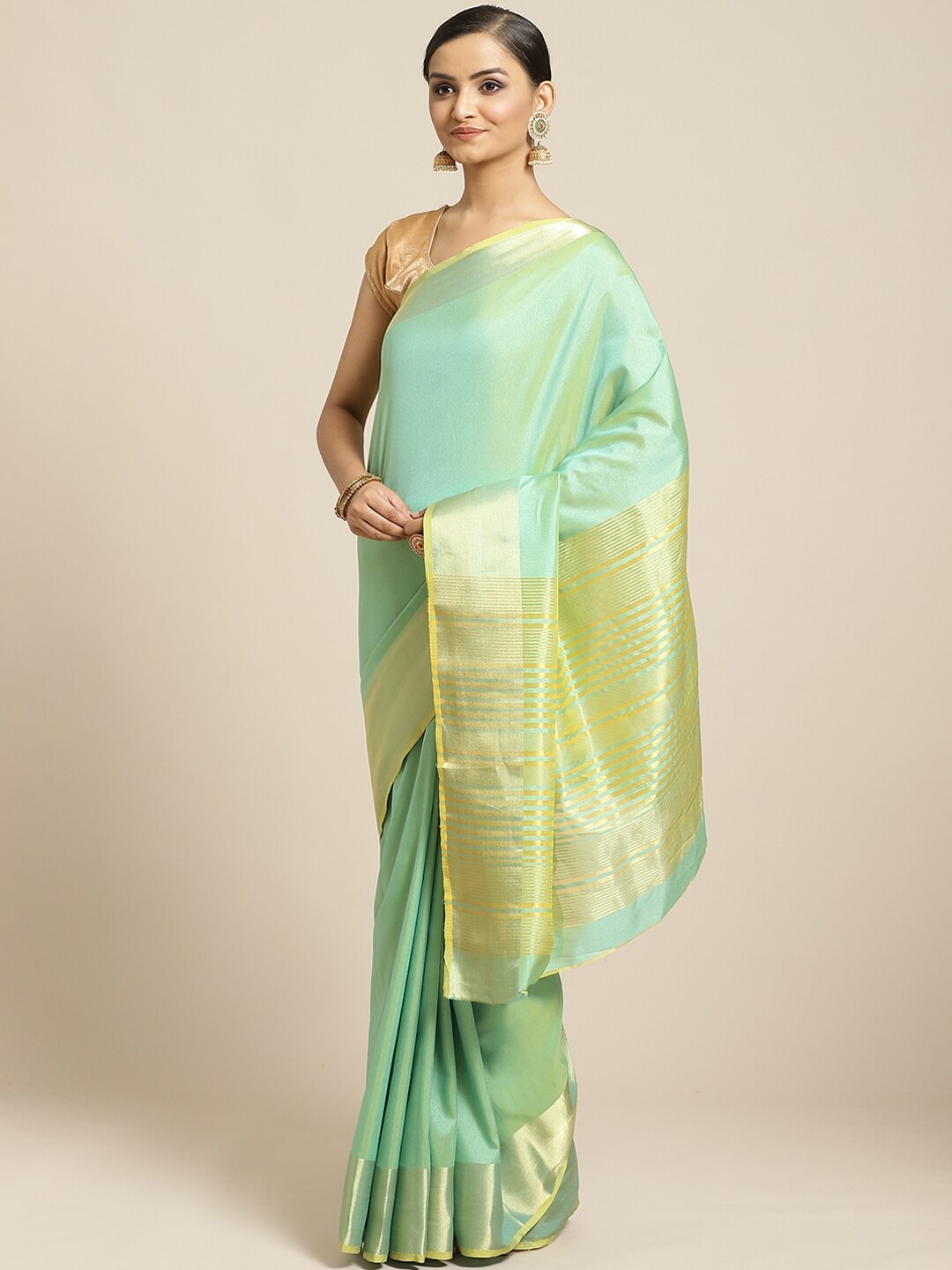 

Shaily Green Solid Saree