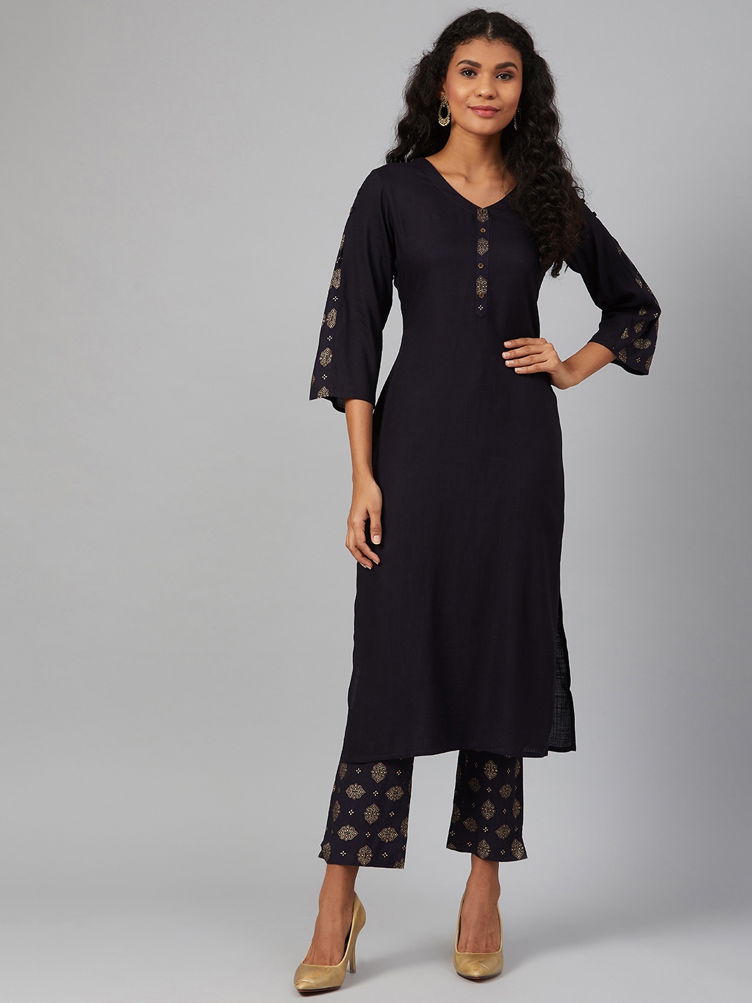 

See Designs Women Navy Blue & Golden Solid Kurta with Printed Trousers