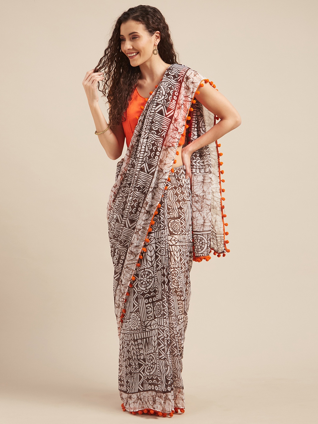 

Tikhi Imli Brown & White Poly Georgette Printed Saree