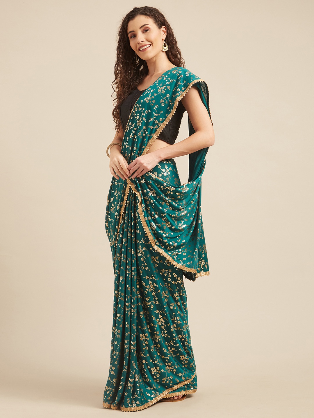 

Tikhi Imli Teal Green & Gold-Coloured Poly Crepe Foil Printed Saree