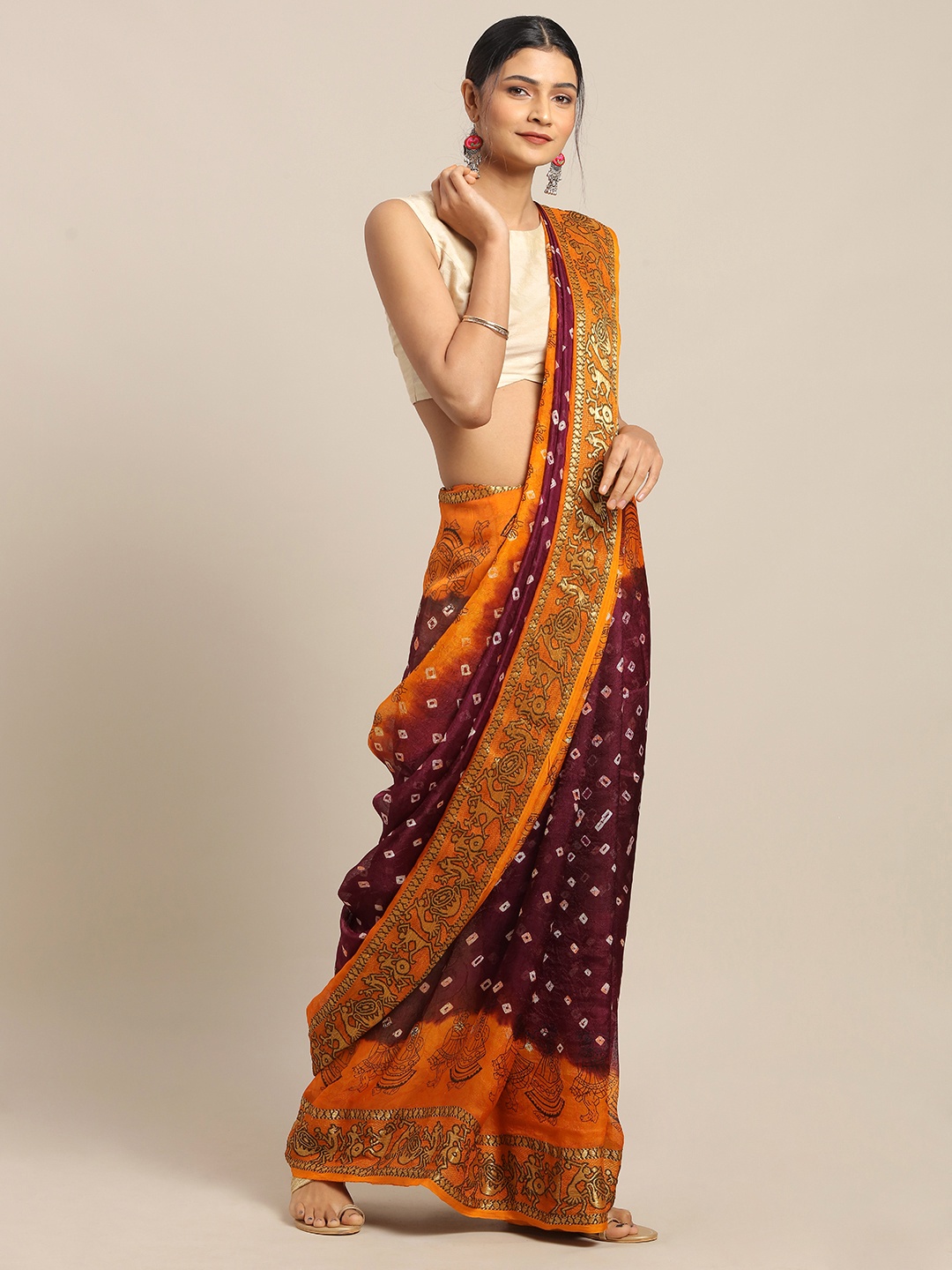 

Geroo Jaipur Hand Dyed Burgundy & Orange Bandhani Silk Sustainable Saree