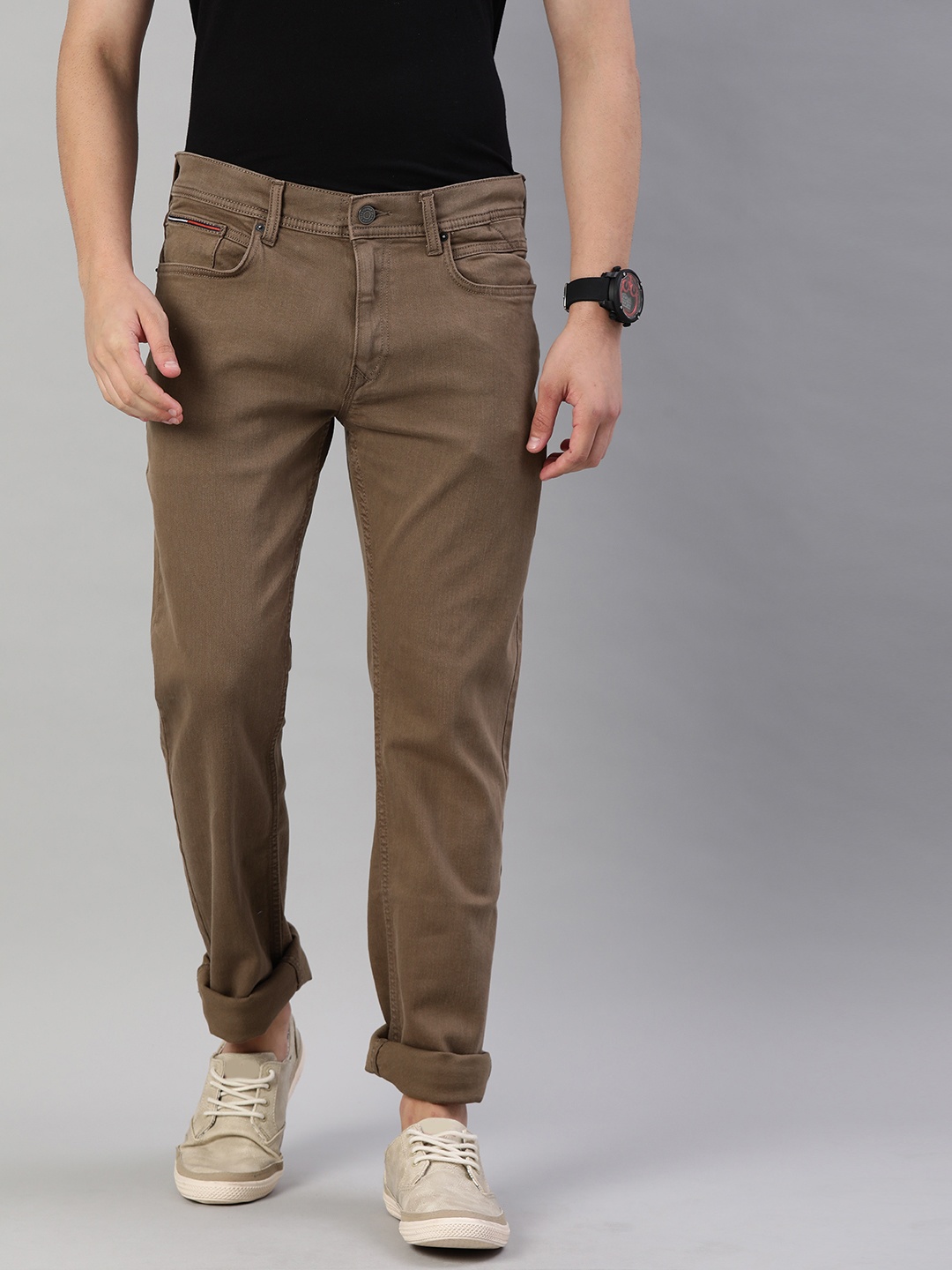 

Tommy Hilfiger Men Brown Slim Fit Mid-Rise Clean Look Stretchable Jeans
