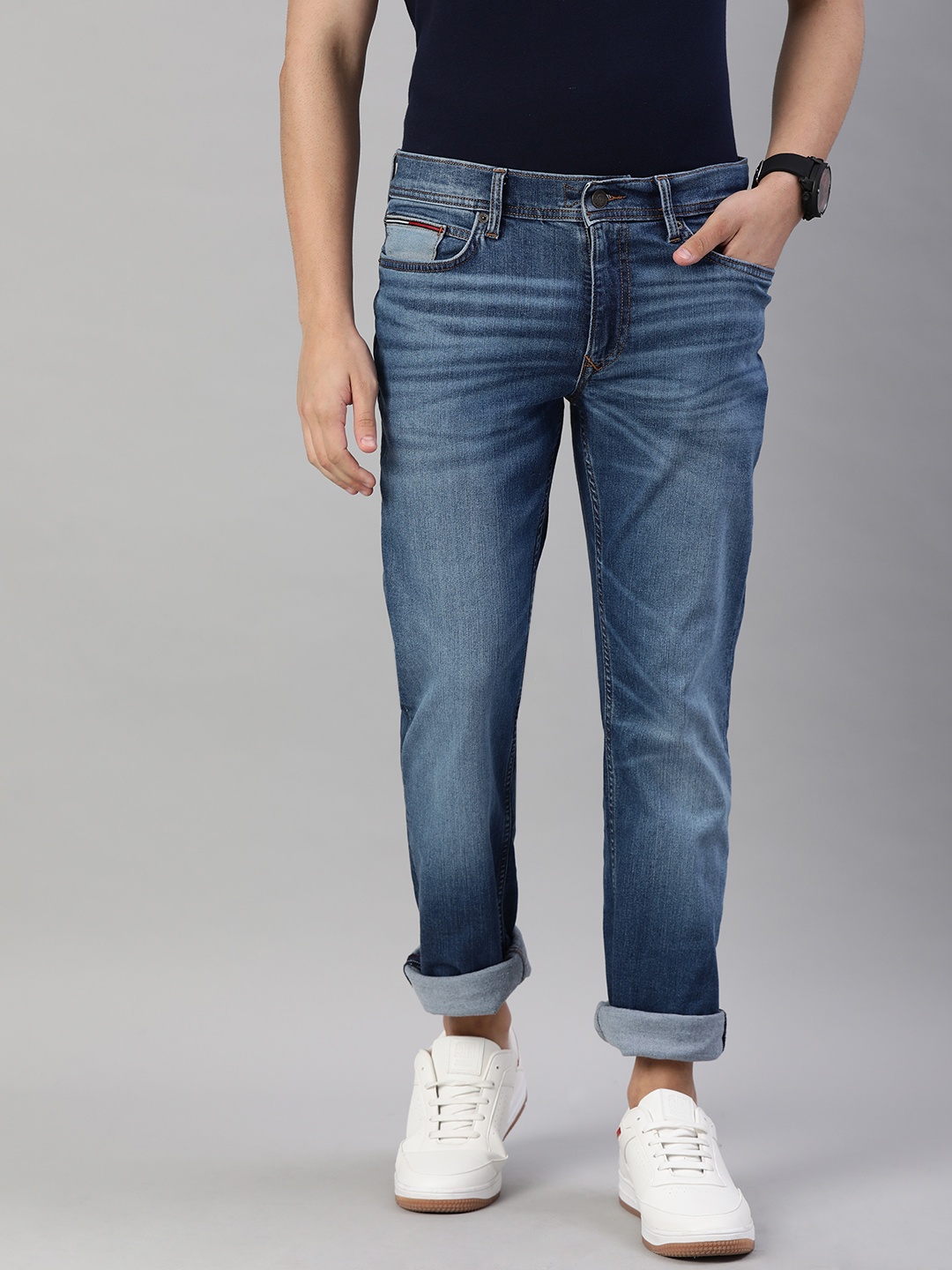 

Tommy Hilfiger Men Blue Slim Fit Mid-Rise Clean Look Stretchable Jeans