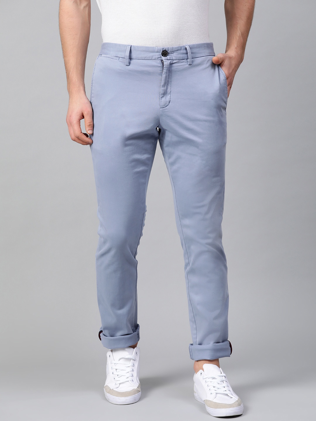 

Tommy Hilfiger Men Blue Solid Slim Fit Chinos