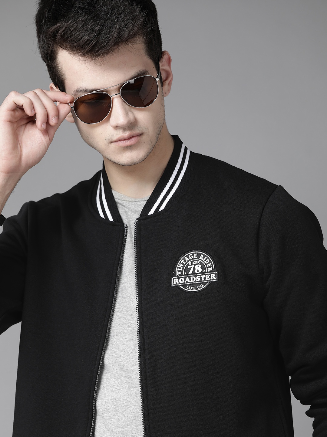 

Roadster Men Black Solid Varsity Jacket