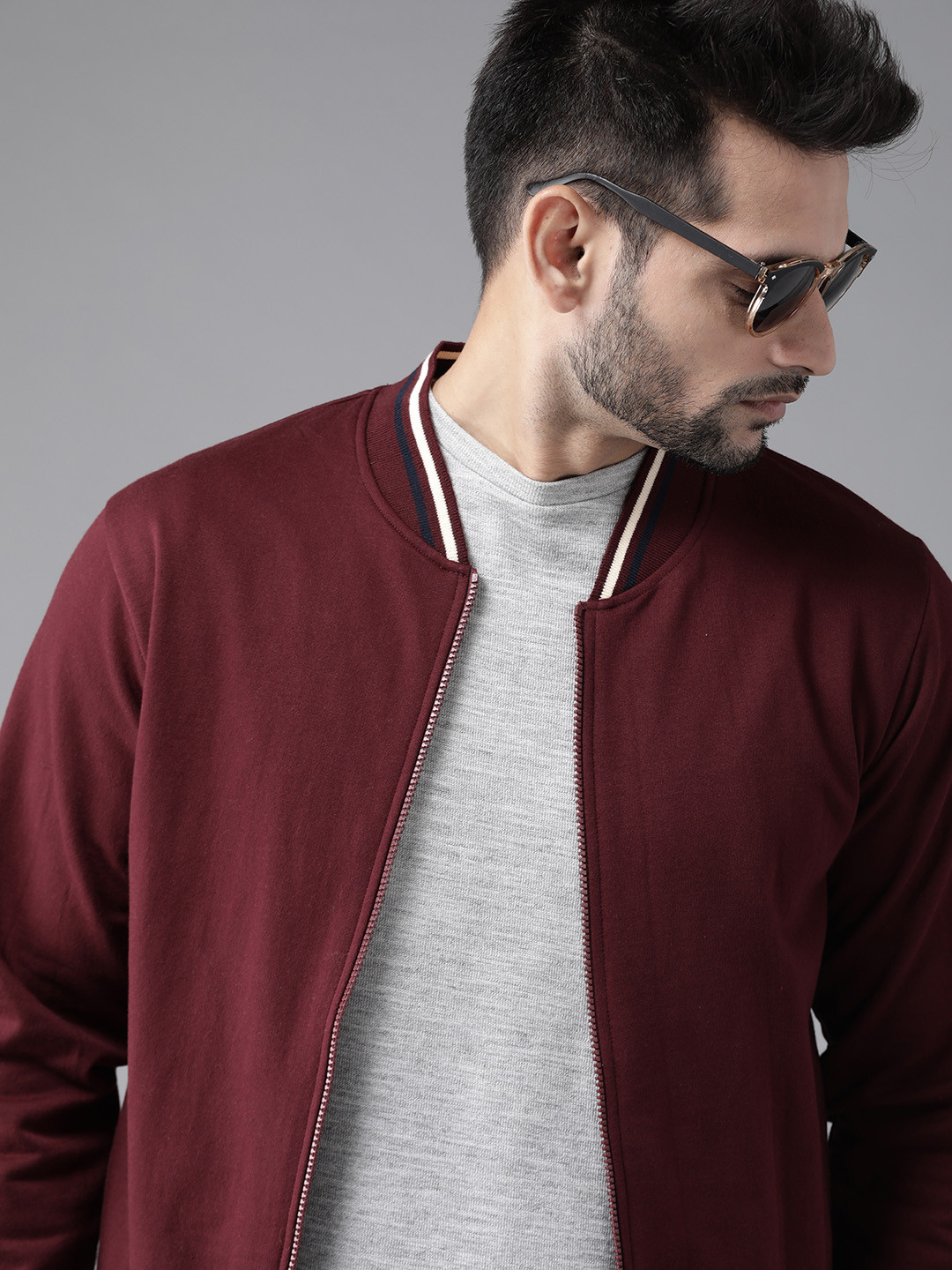 

Roadster Men Burgundy Solid Sweatshirt