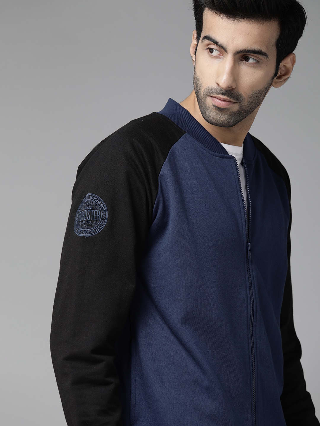 

Roadster Men Navy Blue Solid Raglan Sleeves Sweatshirt