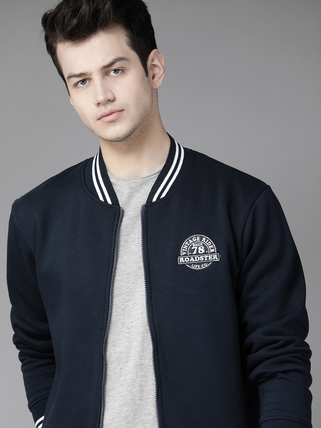 

Roadster Men Navy Blue Solid Varsity Jacket