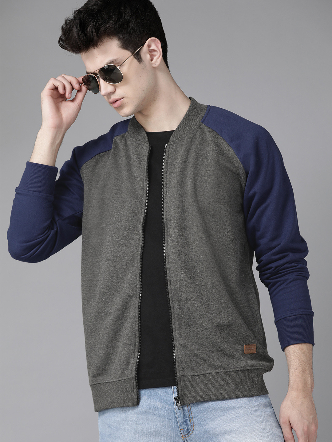 

Roadster Men Charcoal Grey Solid Sweatshirt