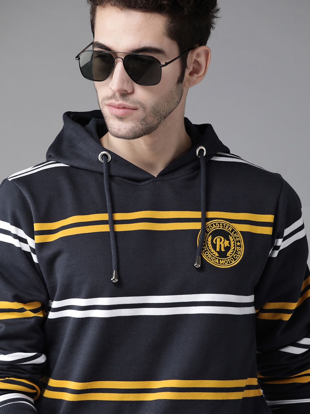 

Roadster Men Navy Blue & Yellow Striped Hooded Sweatshirt