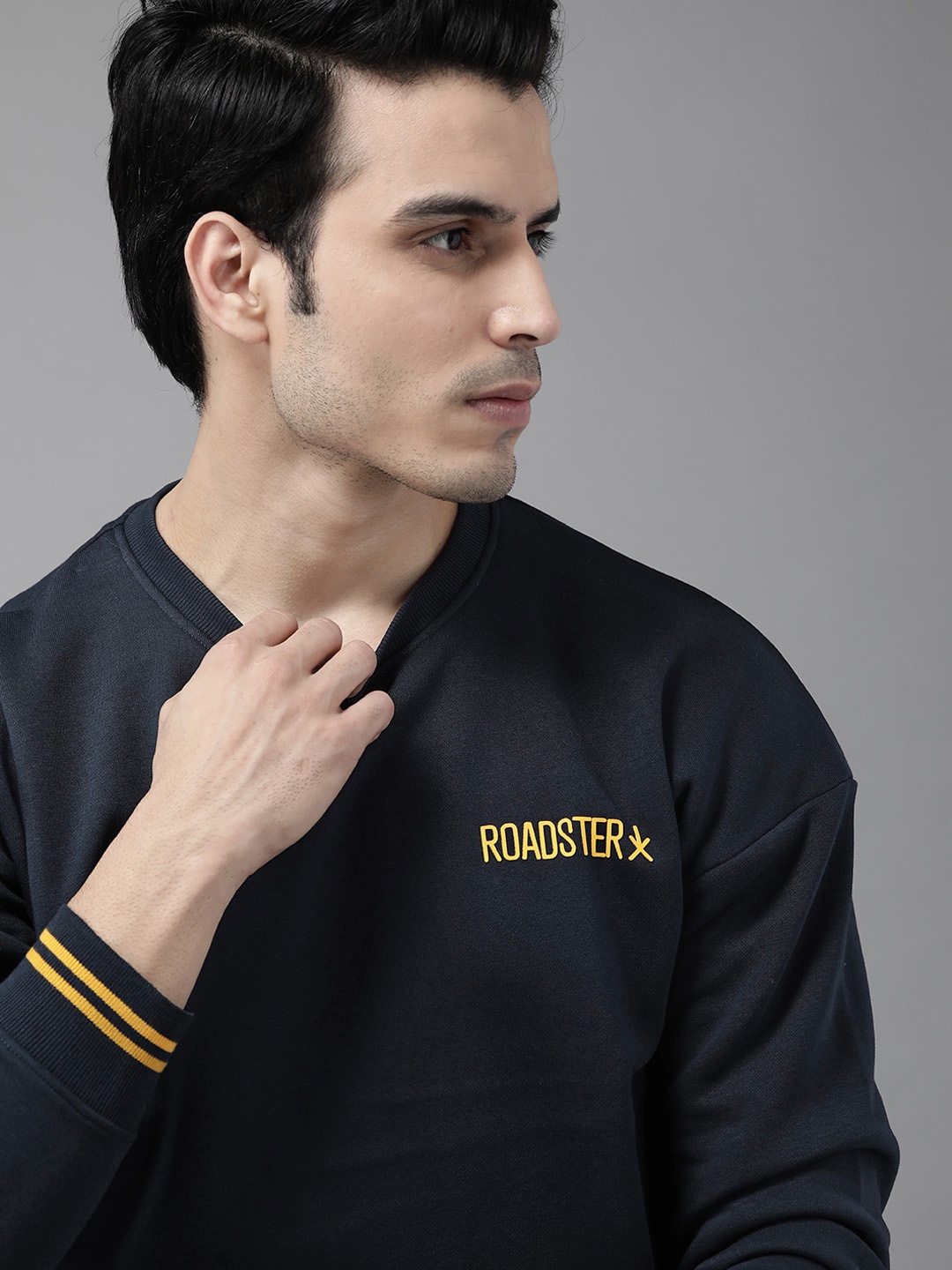 

Roadster Men Navy Blue Solid Sweatshirt