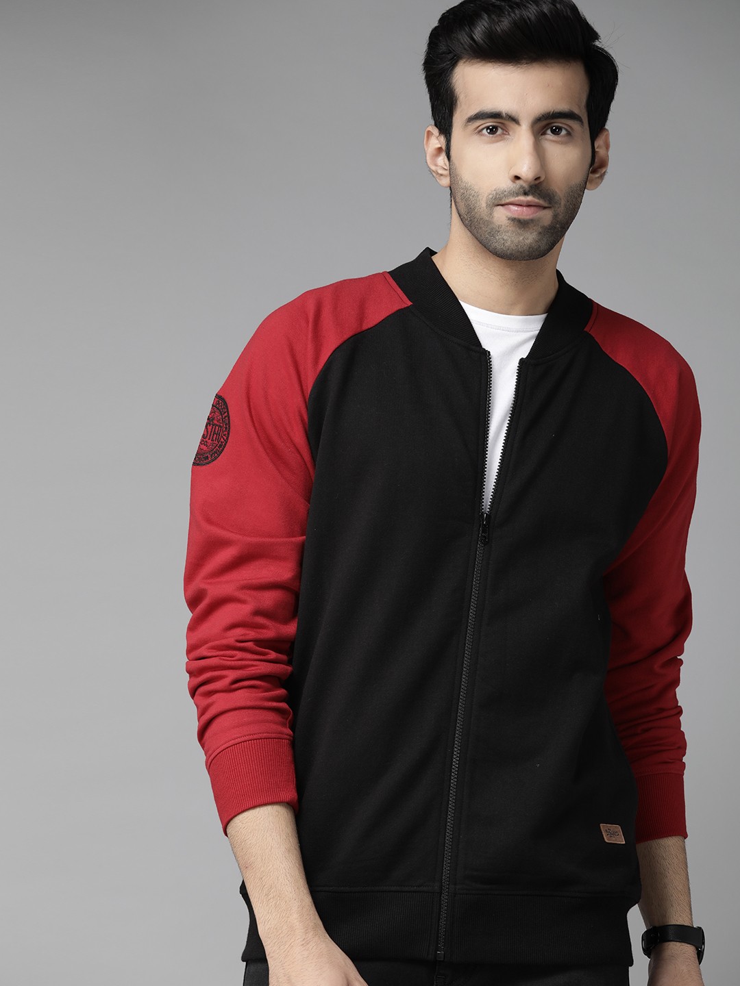 

Roadster Men Black Solid Raglan Sleeves Sweatshirt