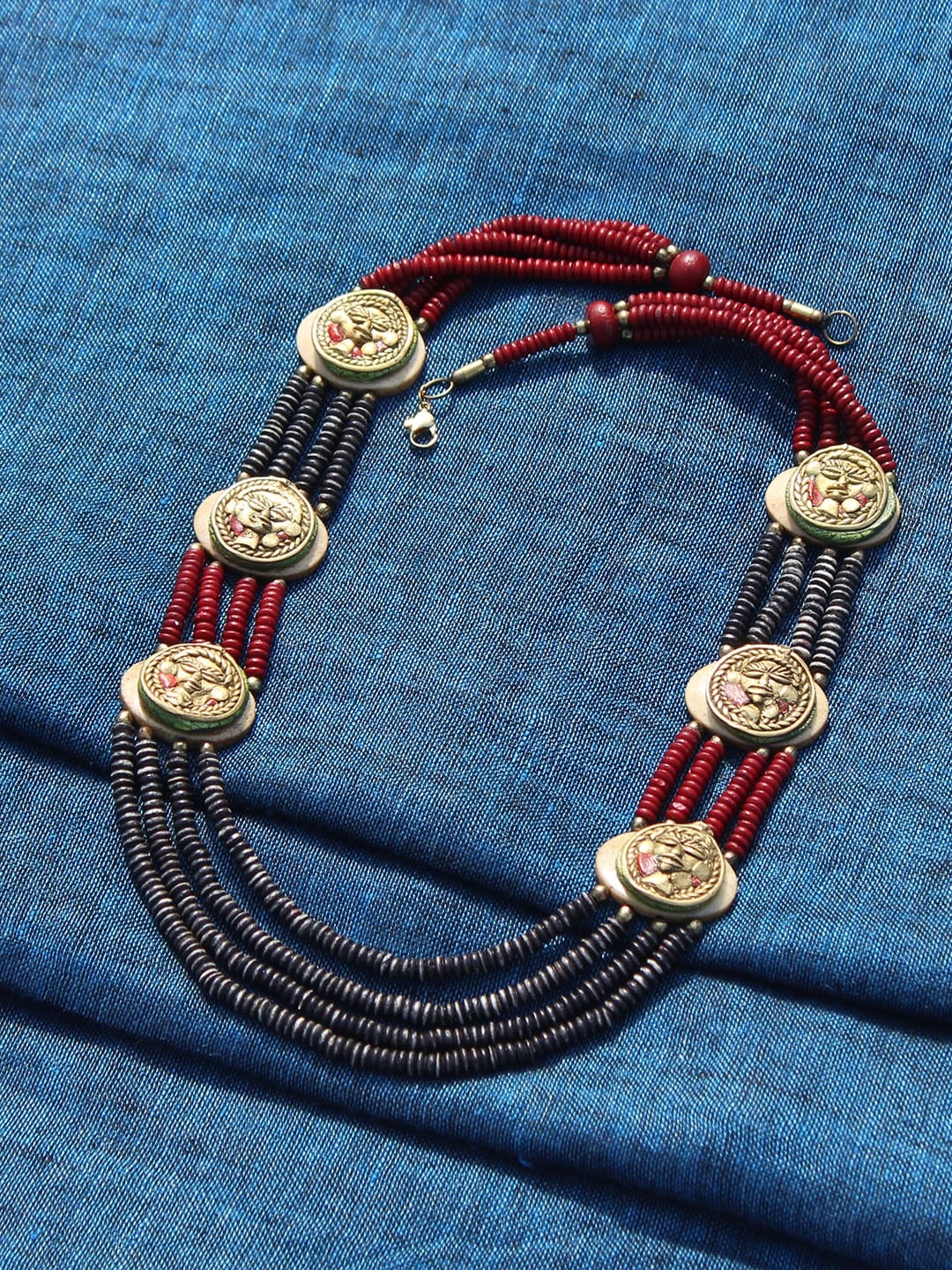 

ExclusiveLane Tribal Men Rounds Gold-Toned Beaded Necklace In Dhokra Art