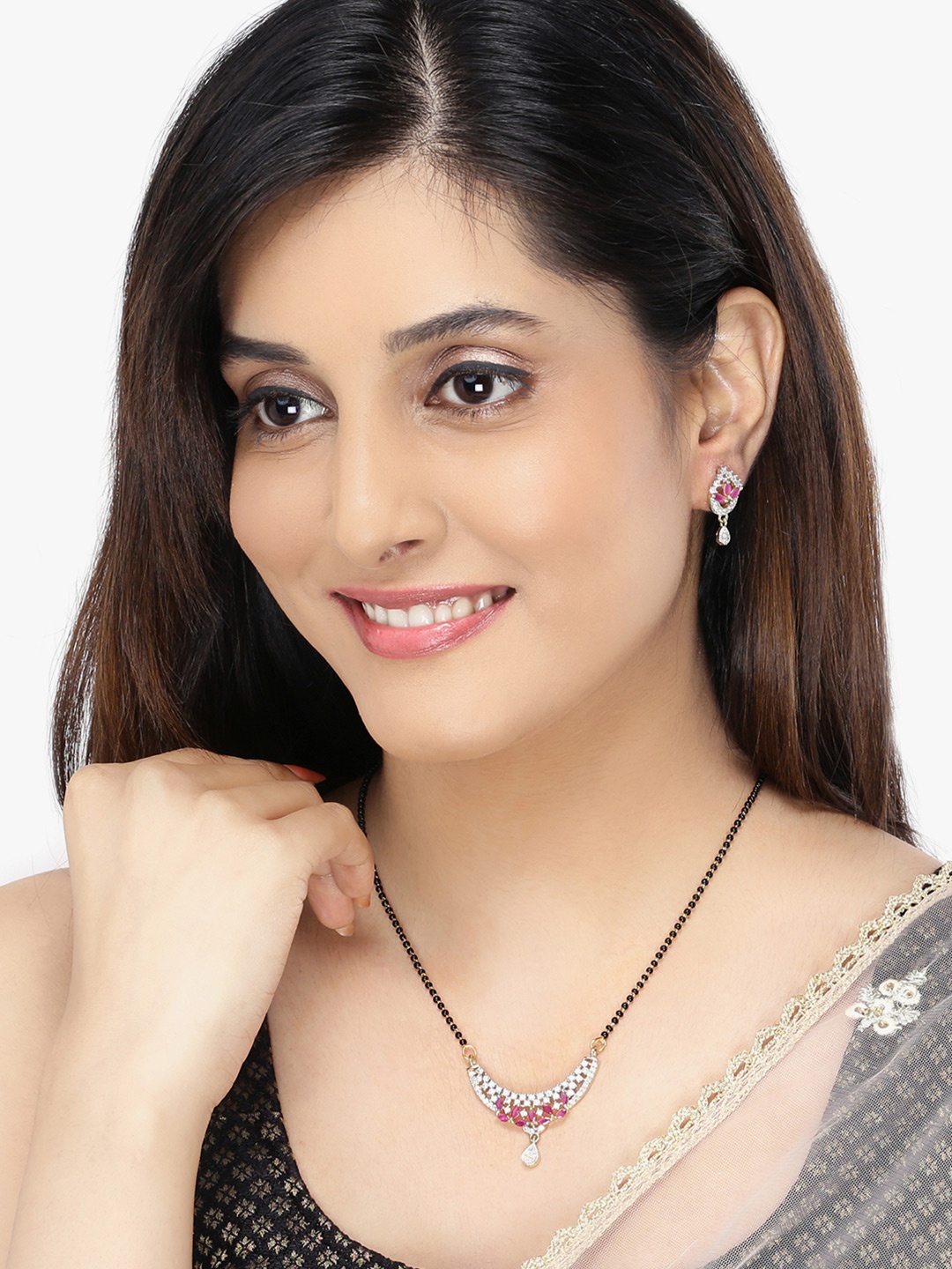 

Yellow Chimes Gold-Plated Black Beaded Floral Theme AD Studded Mangalsutra Set With Earrings