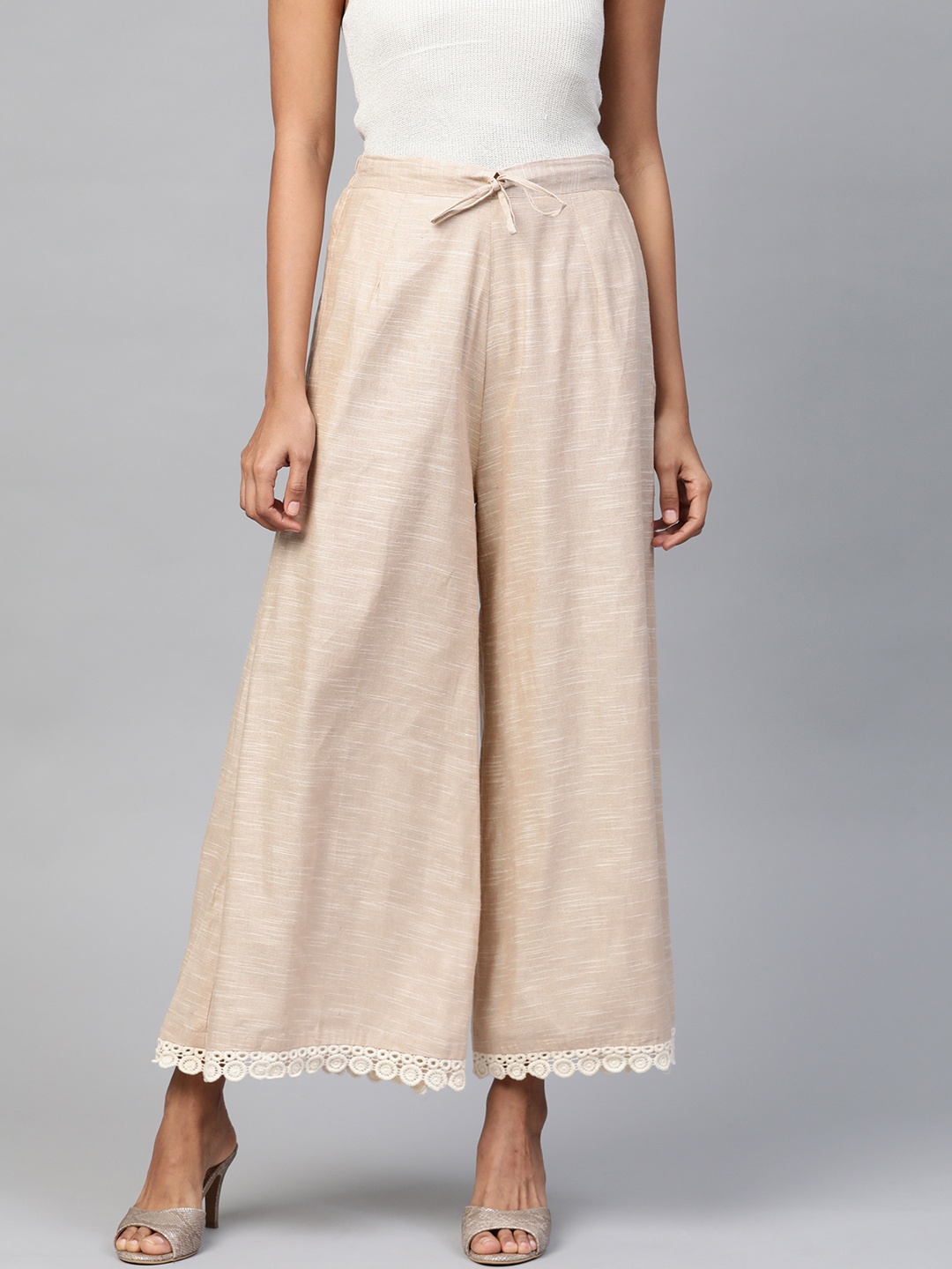 

Laado - Pamper Yourself Women Cream-Coloured Solid Handloom Wide Leg Palazzos
