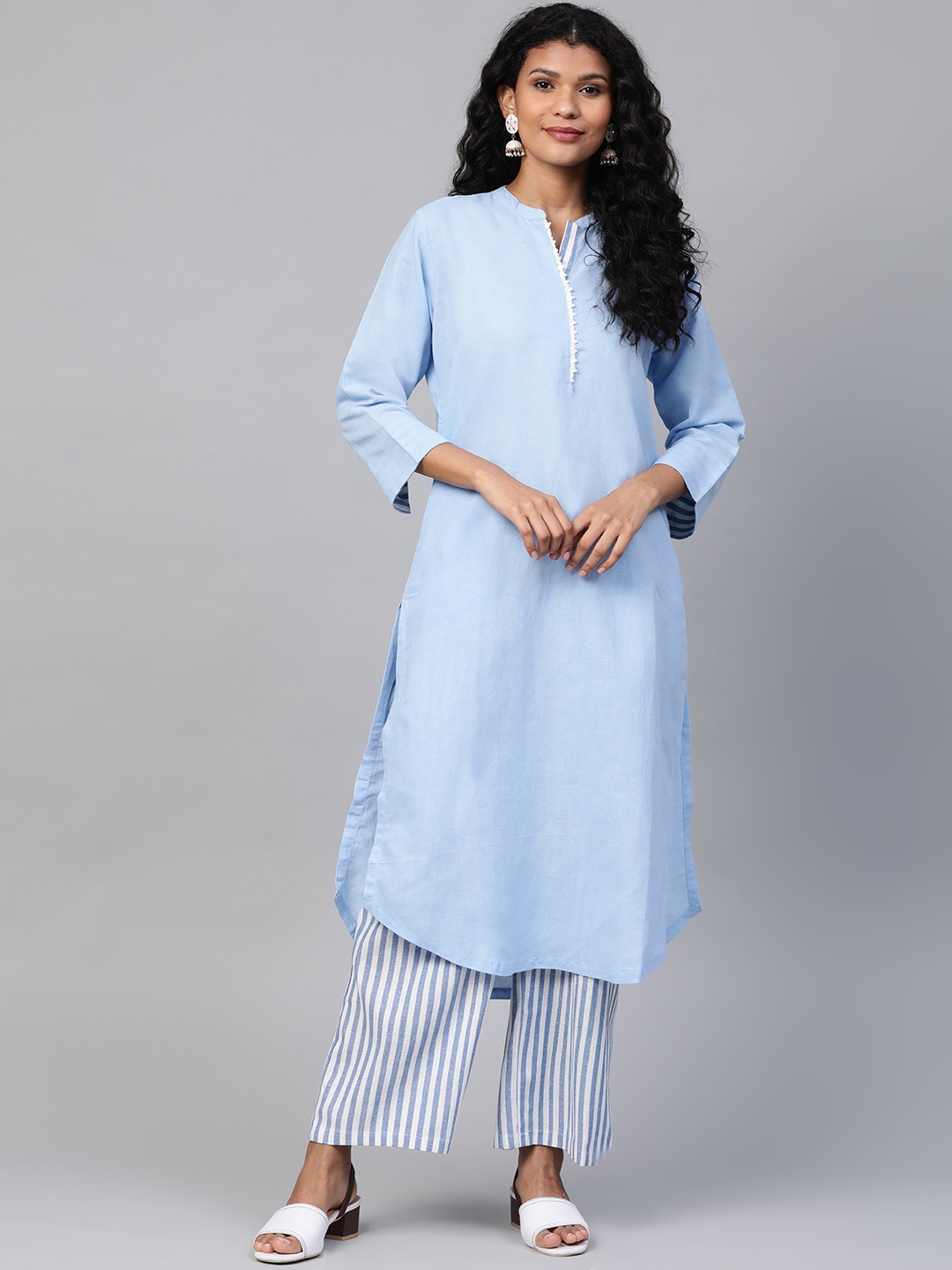 

Laado - Pamper Yourself Women Blue & White Solid Kurta with Sustainable Palazzos