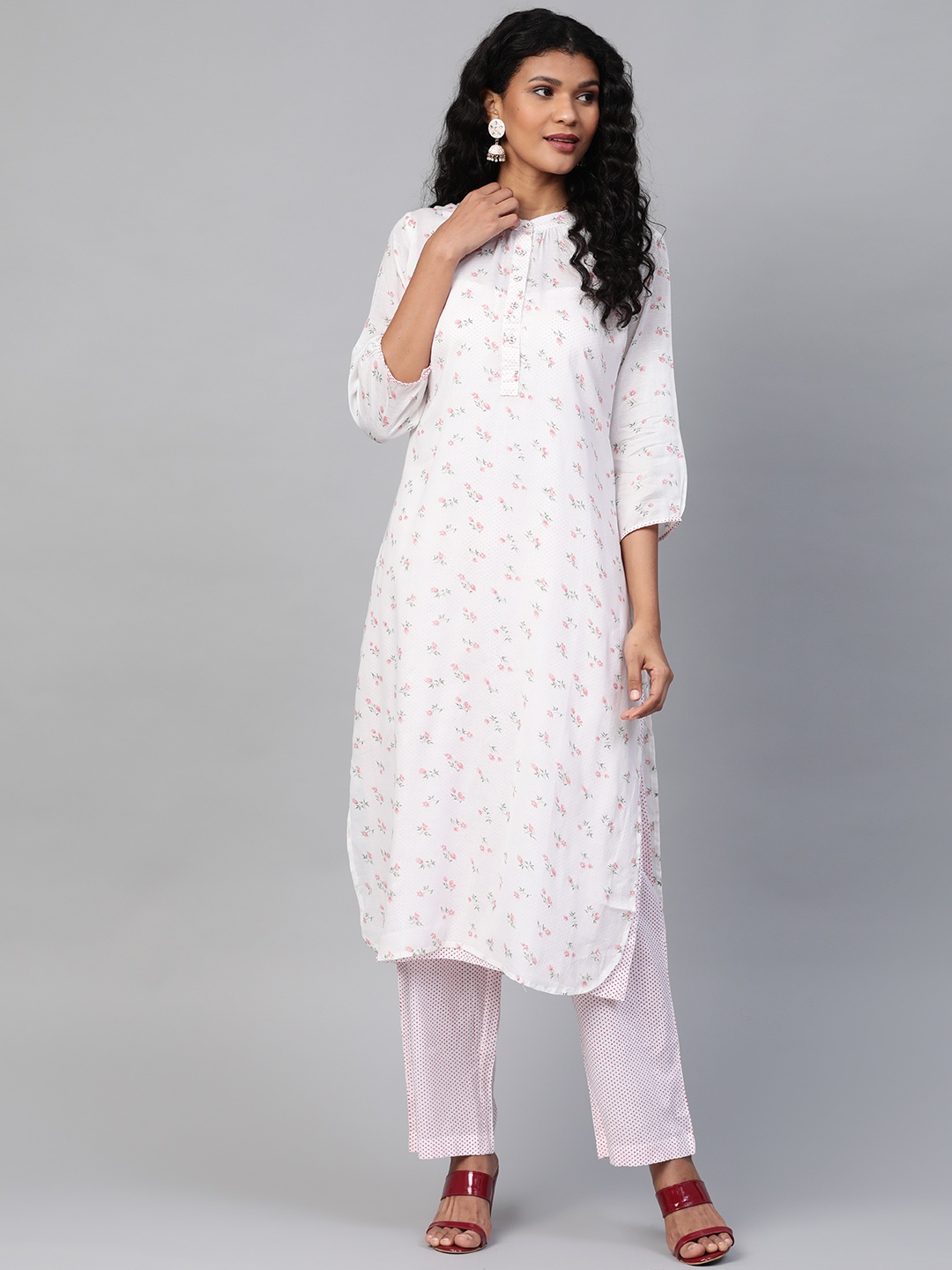 

Laado - Pamper Yourself Women White & Red Floral Printed Kurta with Trousers