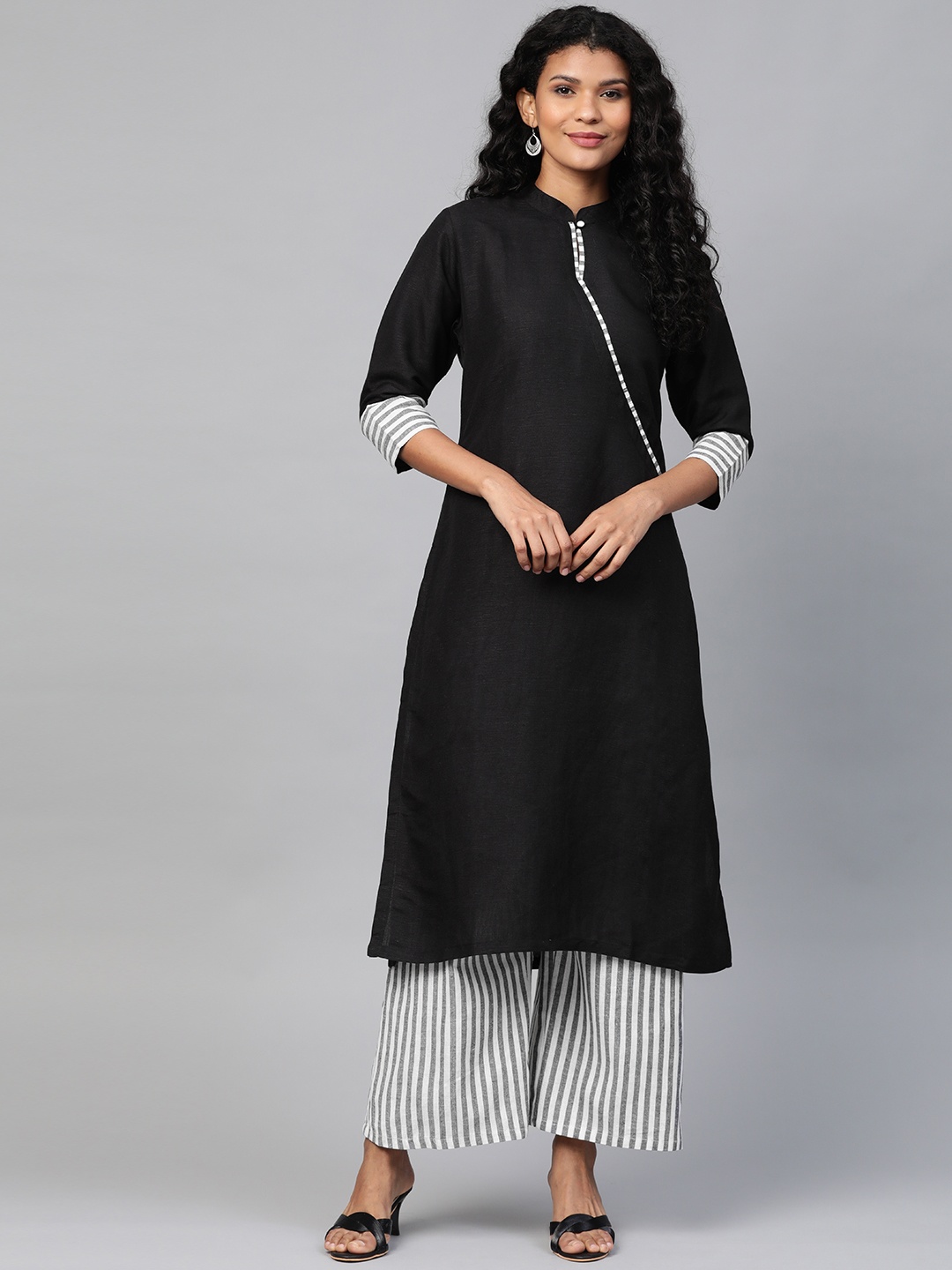 

Laado - Pamper Yourself Women Black & White Solid Kurta with Handloom Sustainable Palazzos