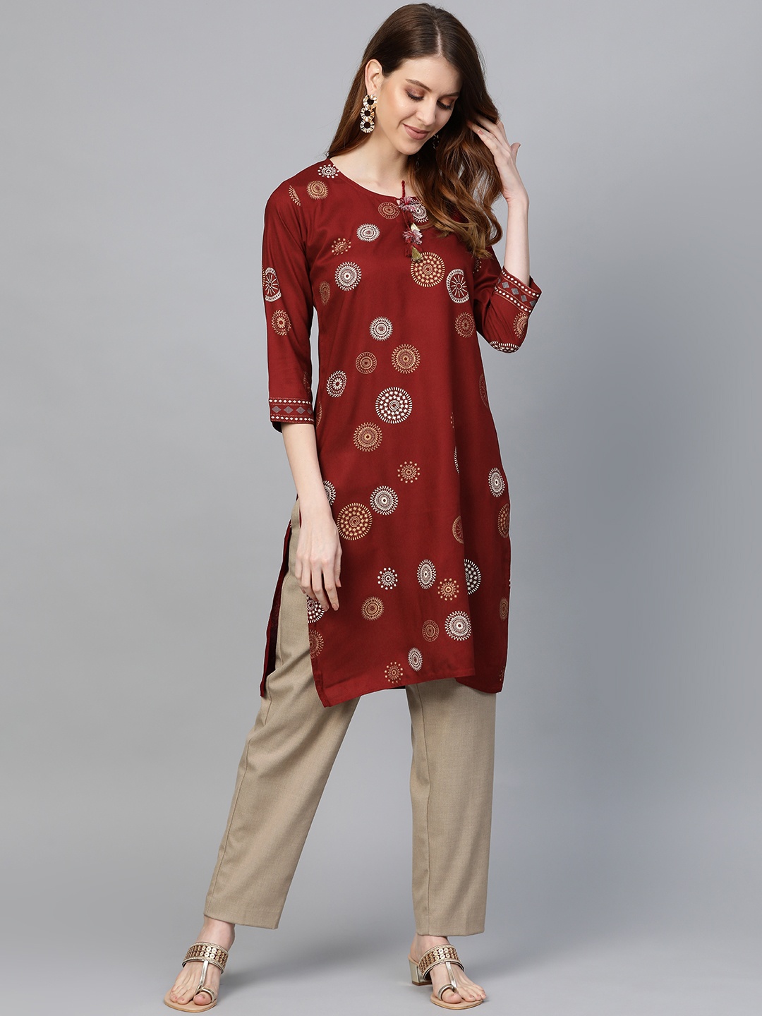 

Anubhutee Women Maroon & Golden Printed Straight Kurta