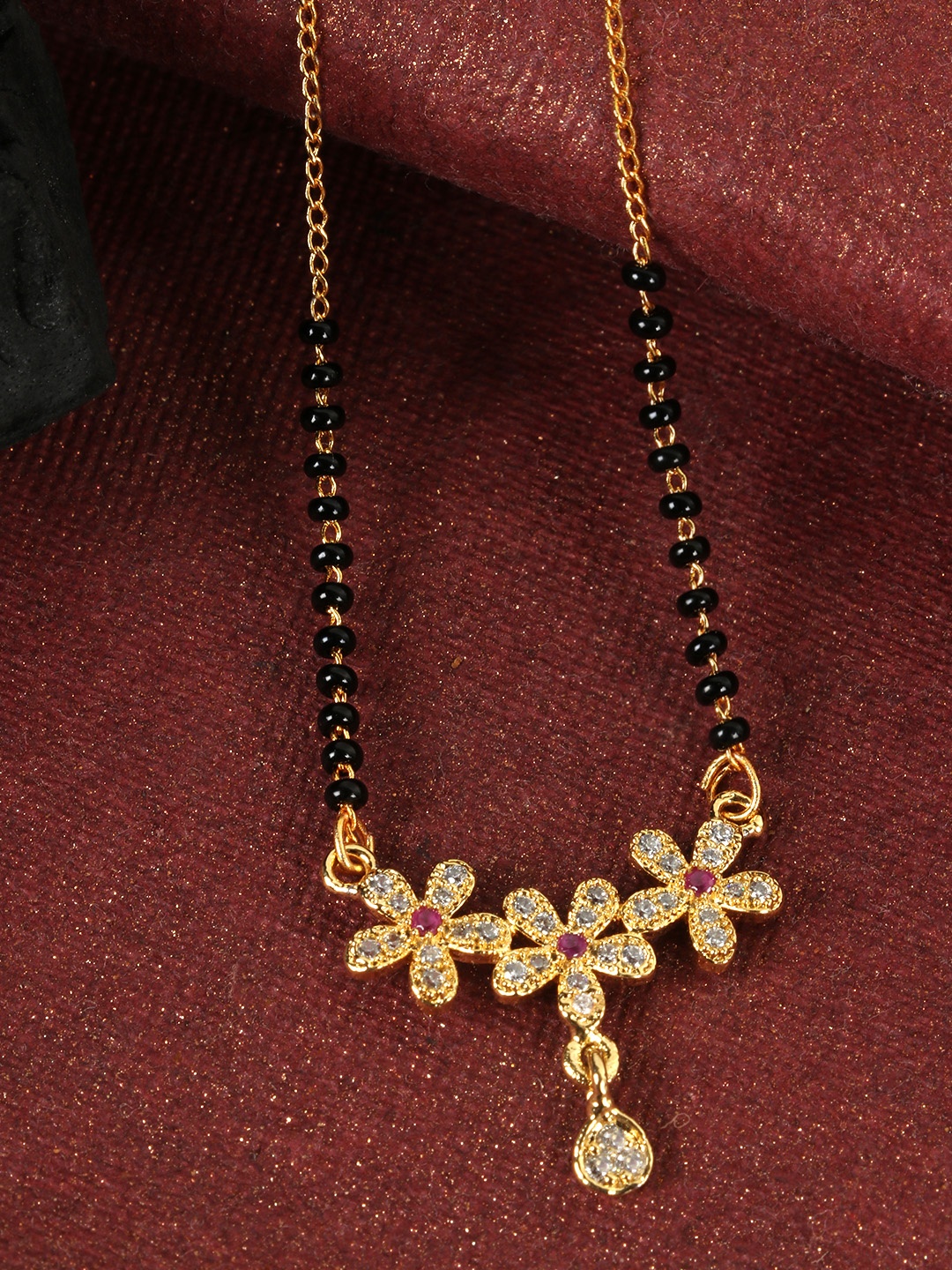 

JEWELS GEHNA Black & Magenta Gold-Plated AD-Studded & Beaded Mangalsutra